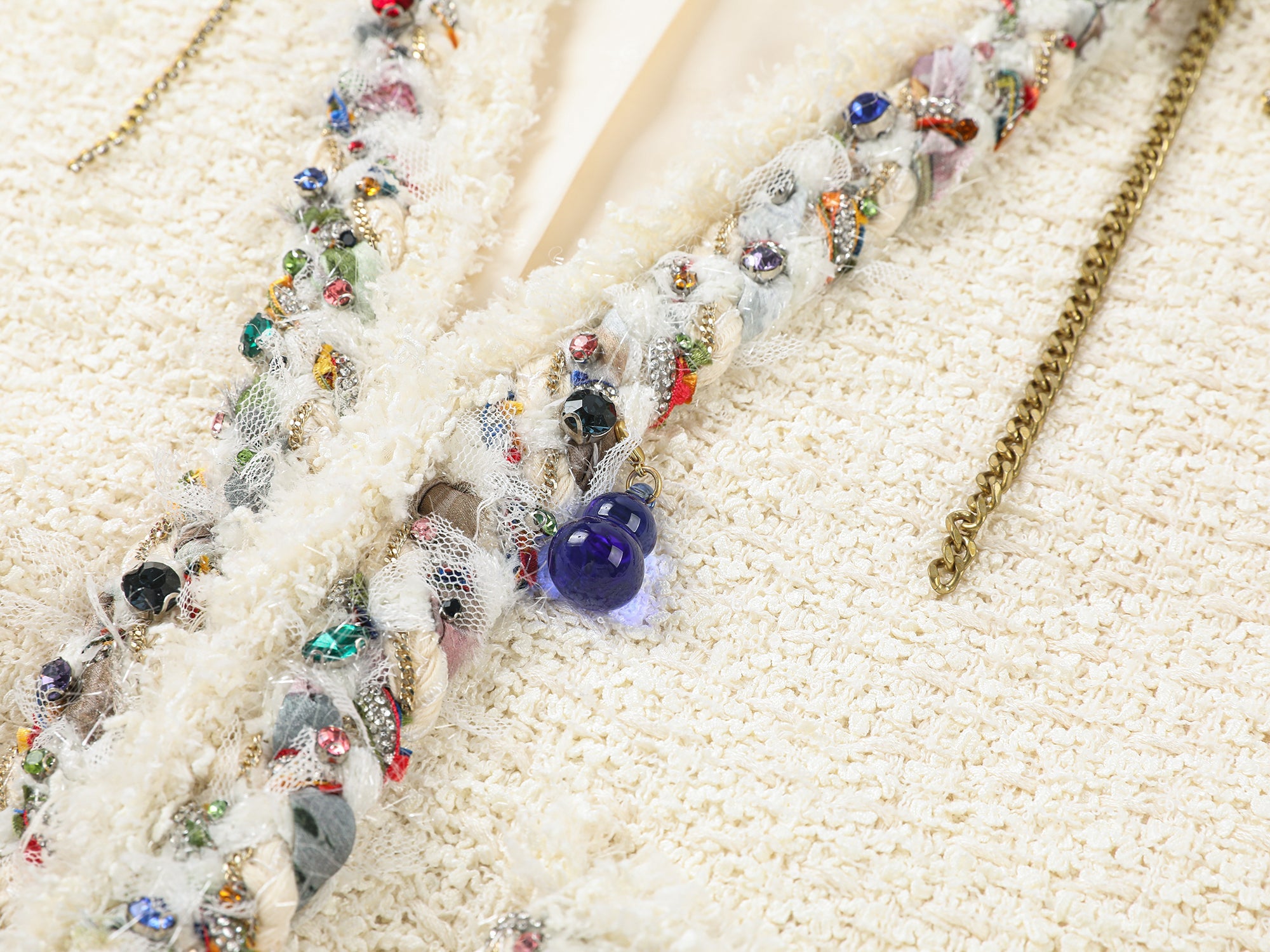 Playful and fun rhinestone chain cropped Chanel-inspired jacket