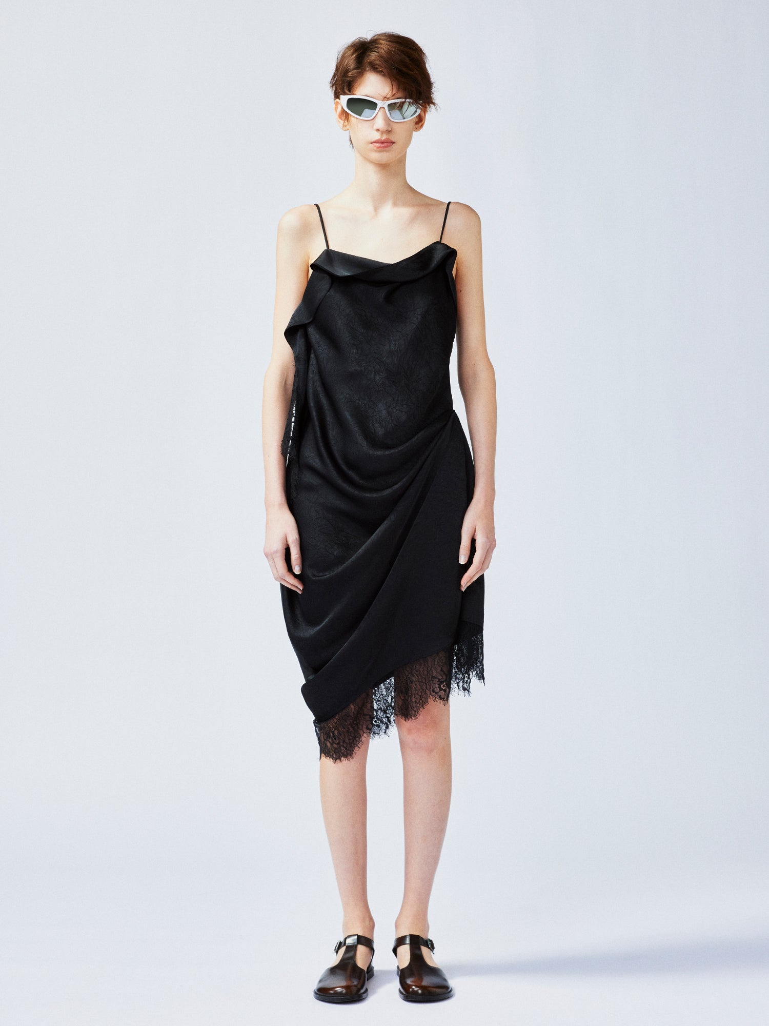 Lace-trimmed slip dress with casually lifted hem