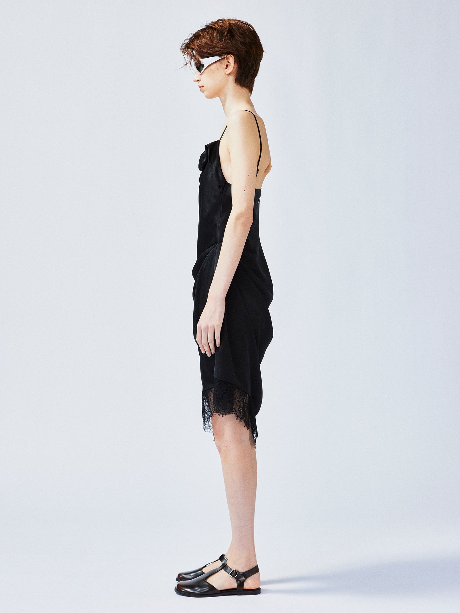 Lace-trimmed slip dress with casually lifted hem