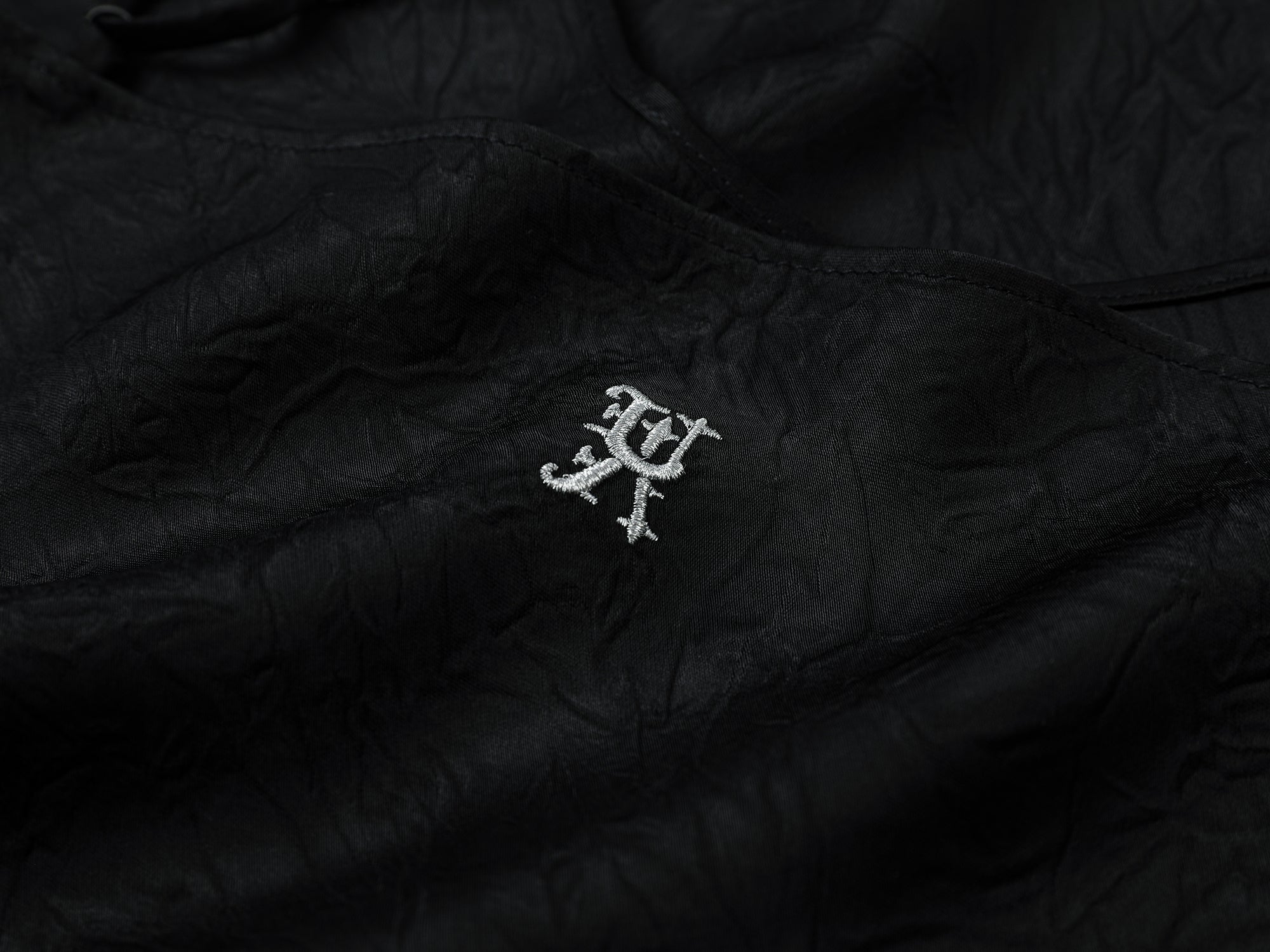 Lace-trimmed slip dress with casually lifted hem