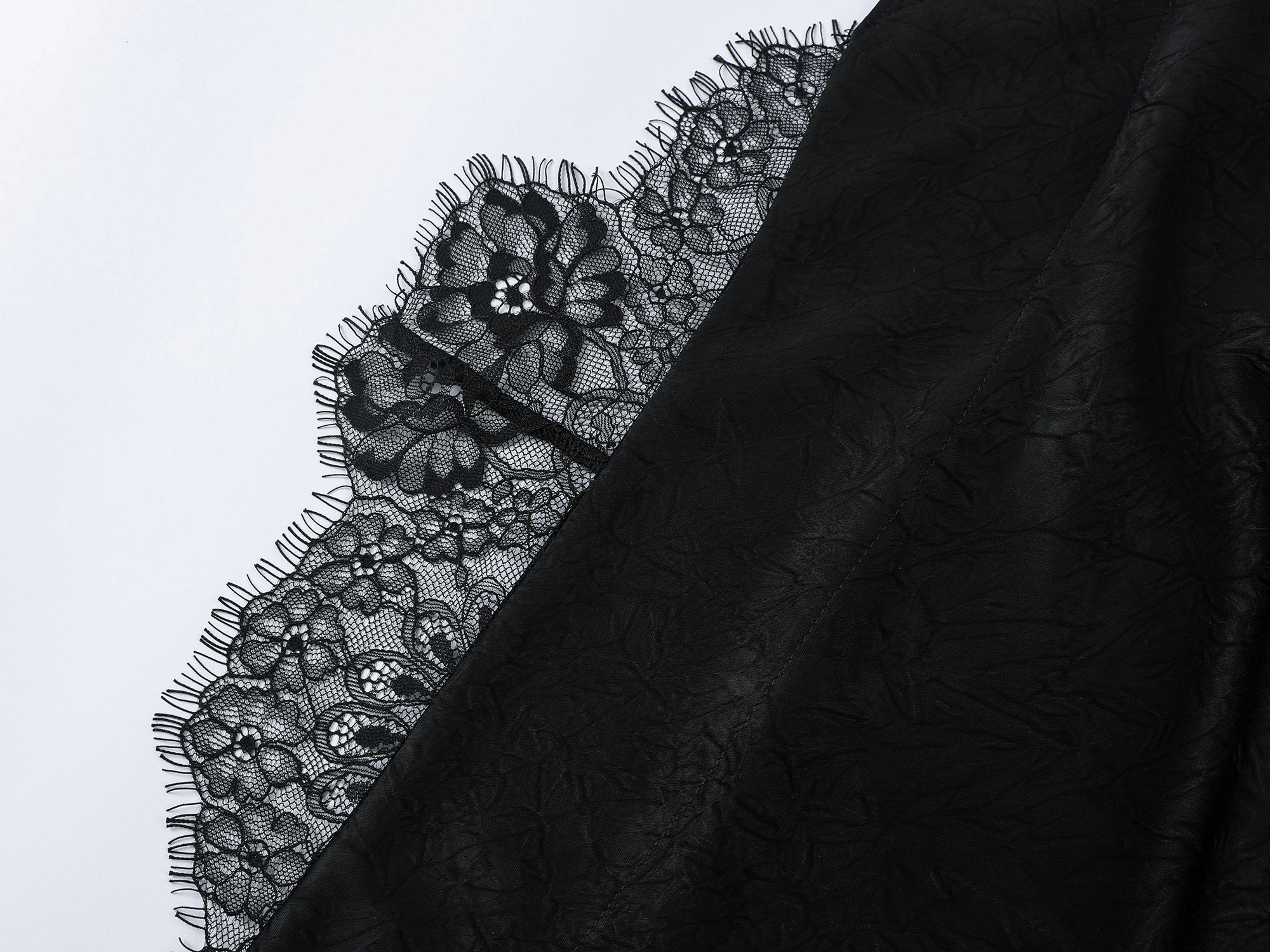 Lace-trimmed slip dress with casually lifted hem