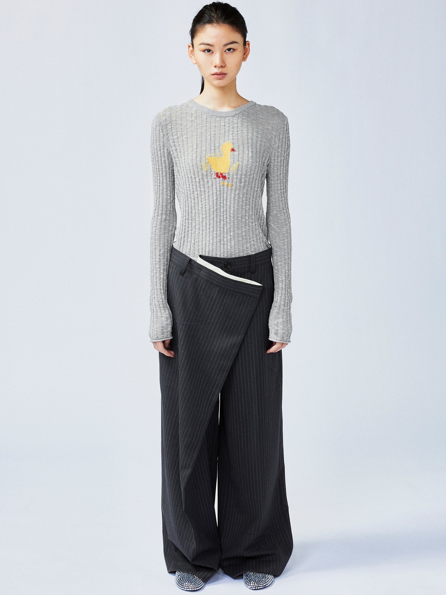 Pulled pleated suit pants with authentic wear marks