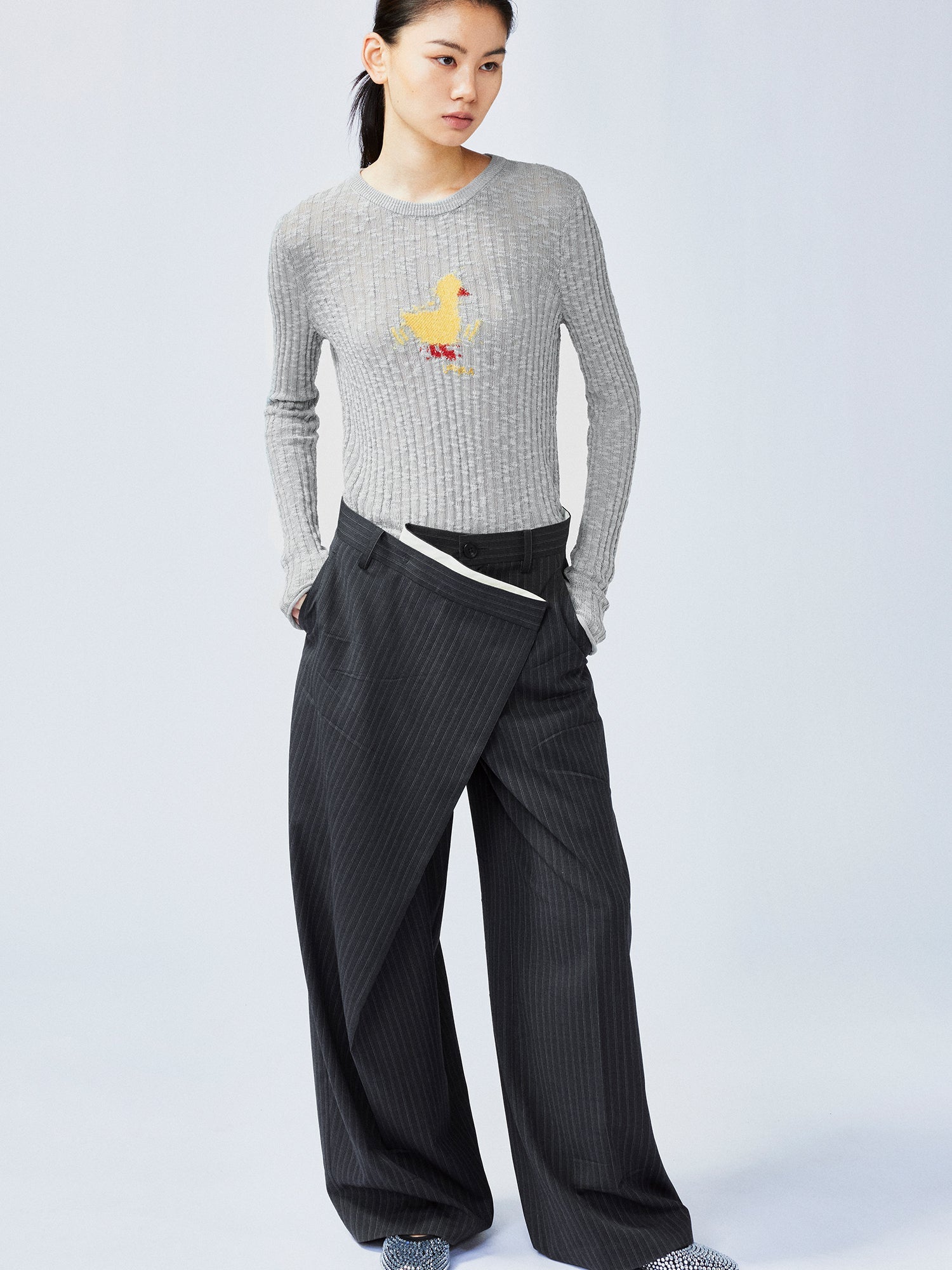 Pulled pleated suit pants with authentic wear marks