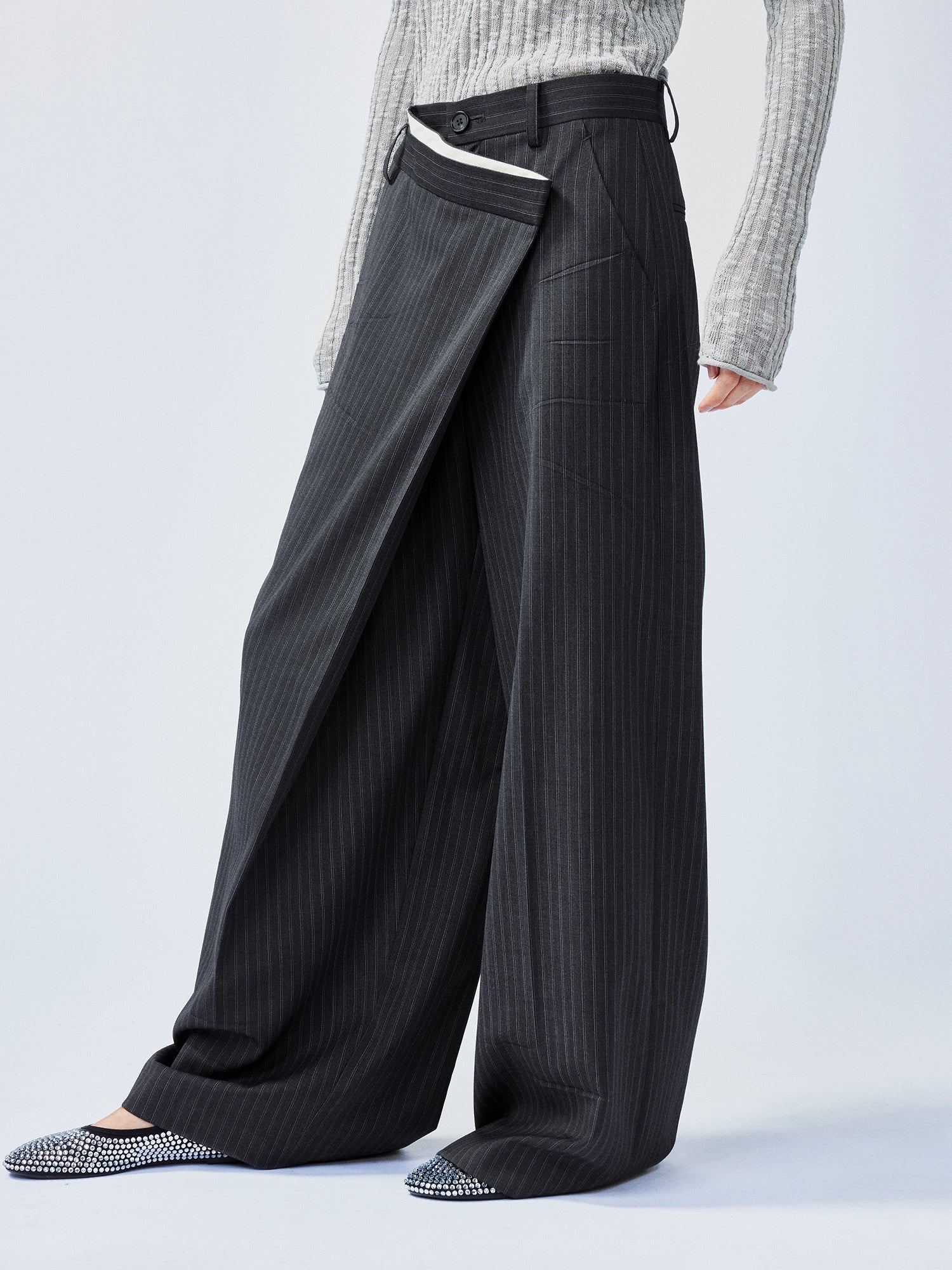 Pulled pleated suit pants with authentic wear marks