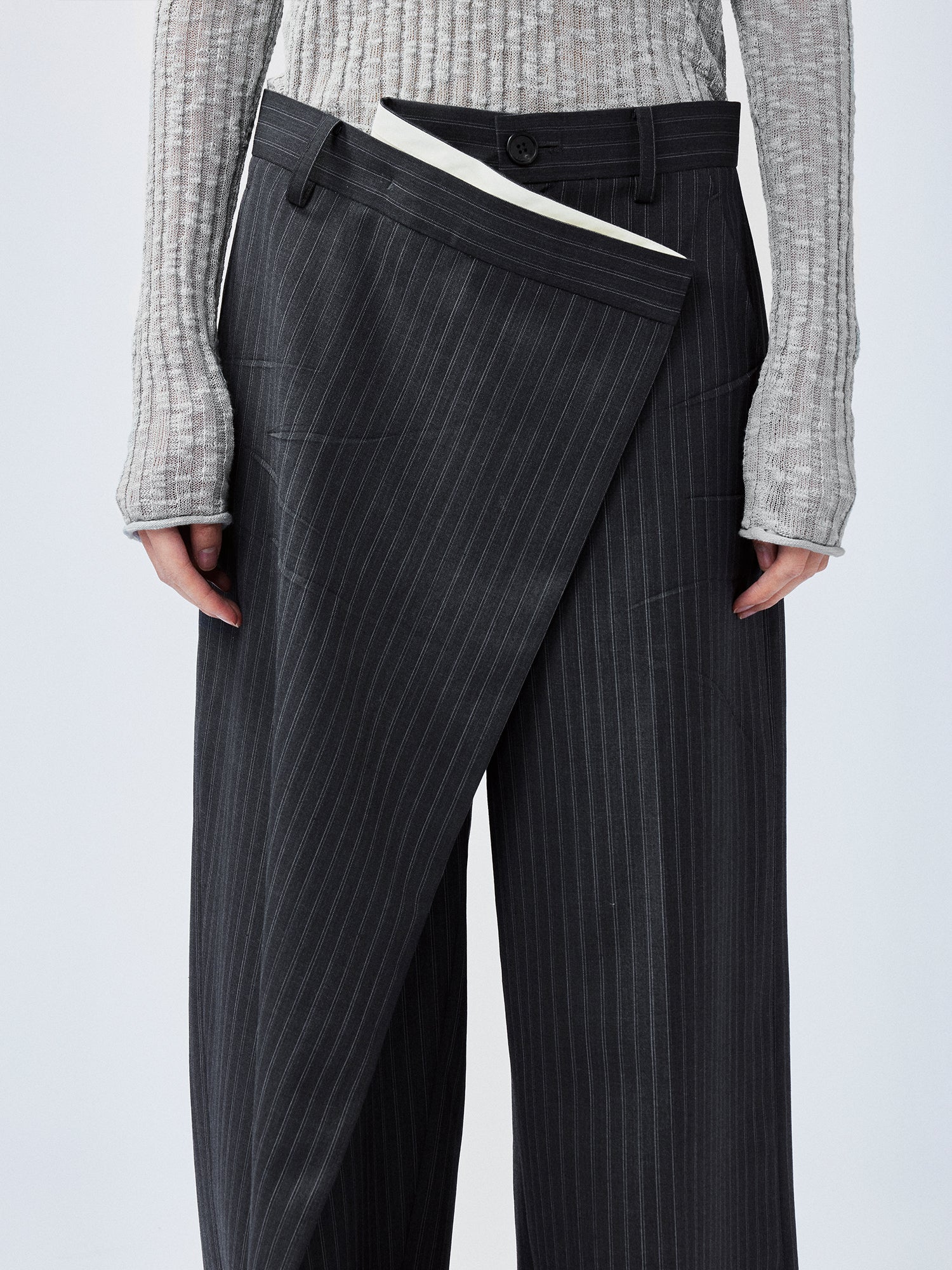 Pulled pleated suit pants with authentic wear marks