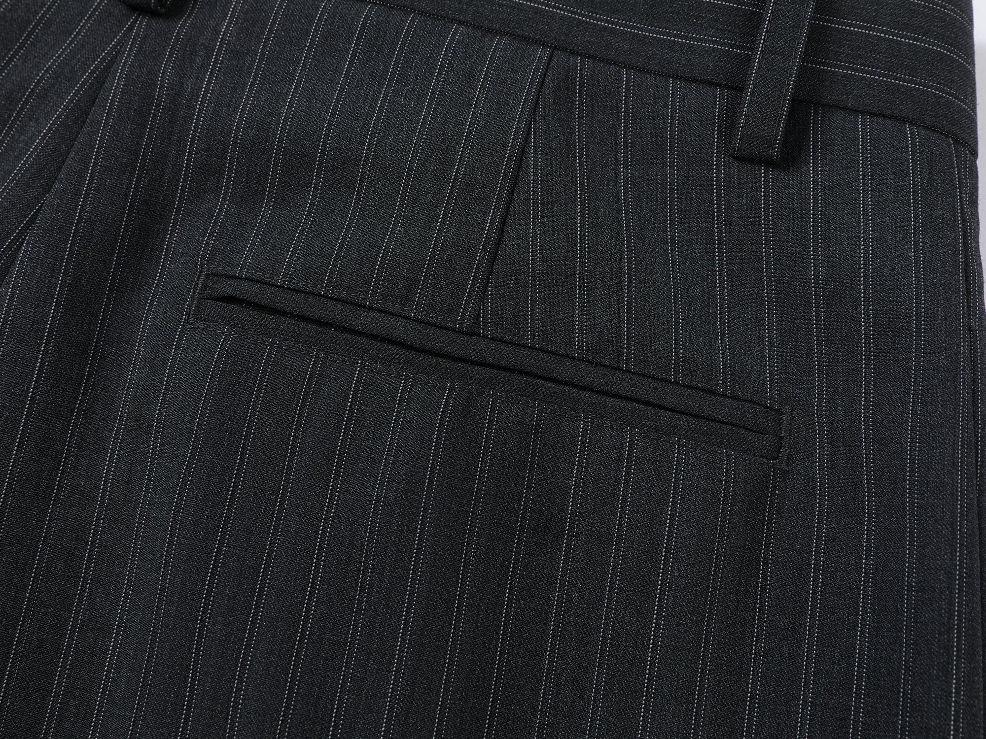 Pulled pleated suit pants with authentic wear marks