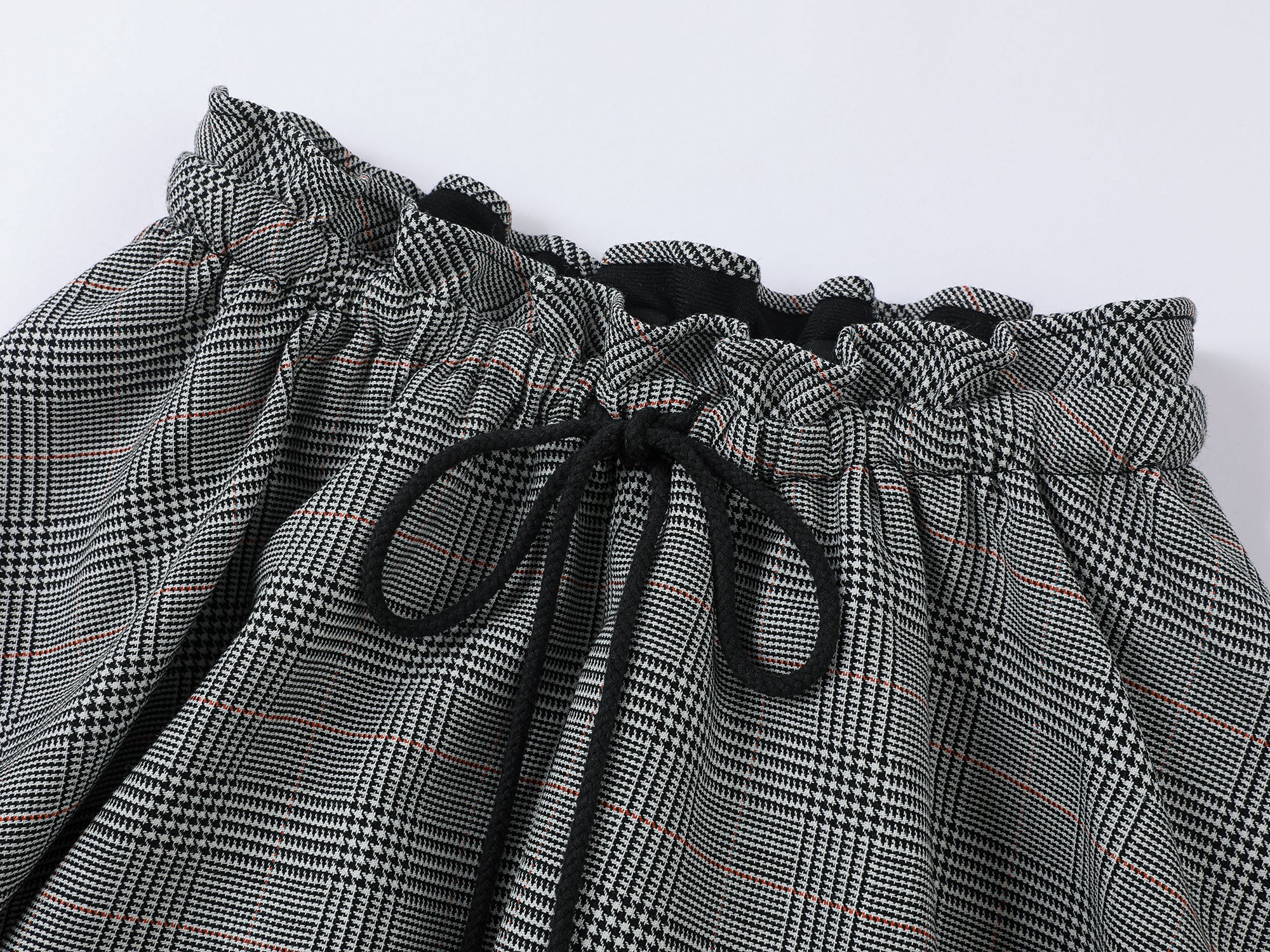 Playful and stylish finely woven plaid mini skirt with a hidden twist