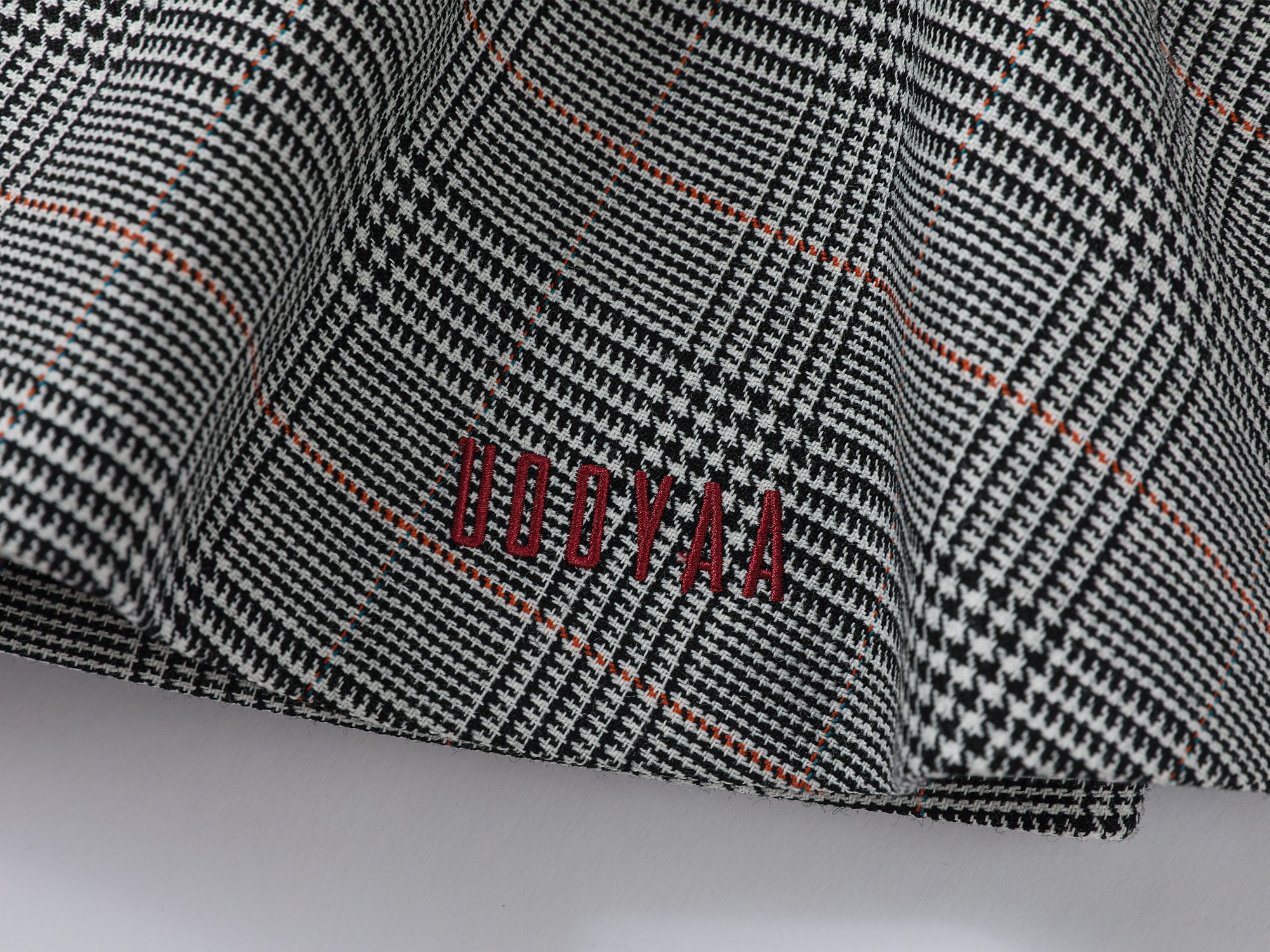 Playful and stylish finely woven plaid mini skirt with a hidden twist