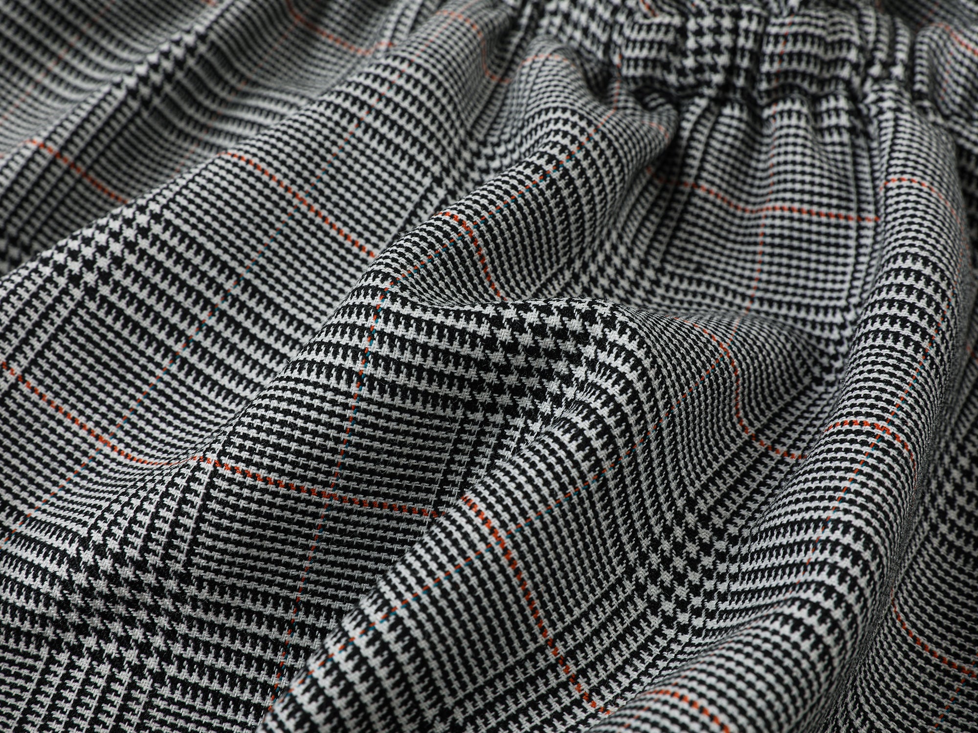 Playful and stylish finely woven plaid mini skirt with a hidden twist