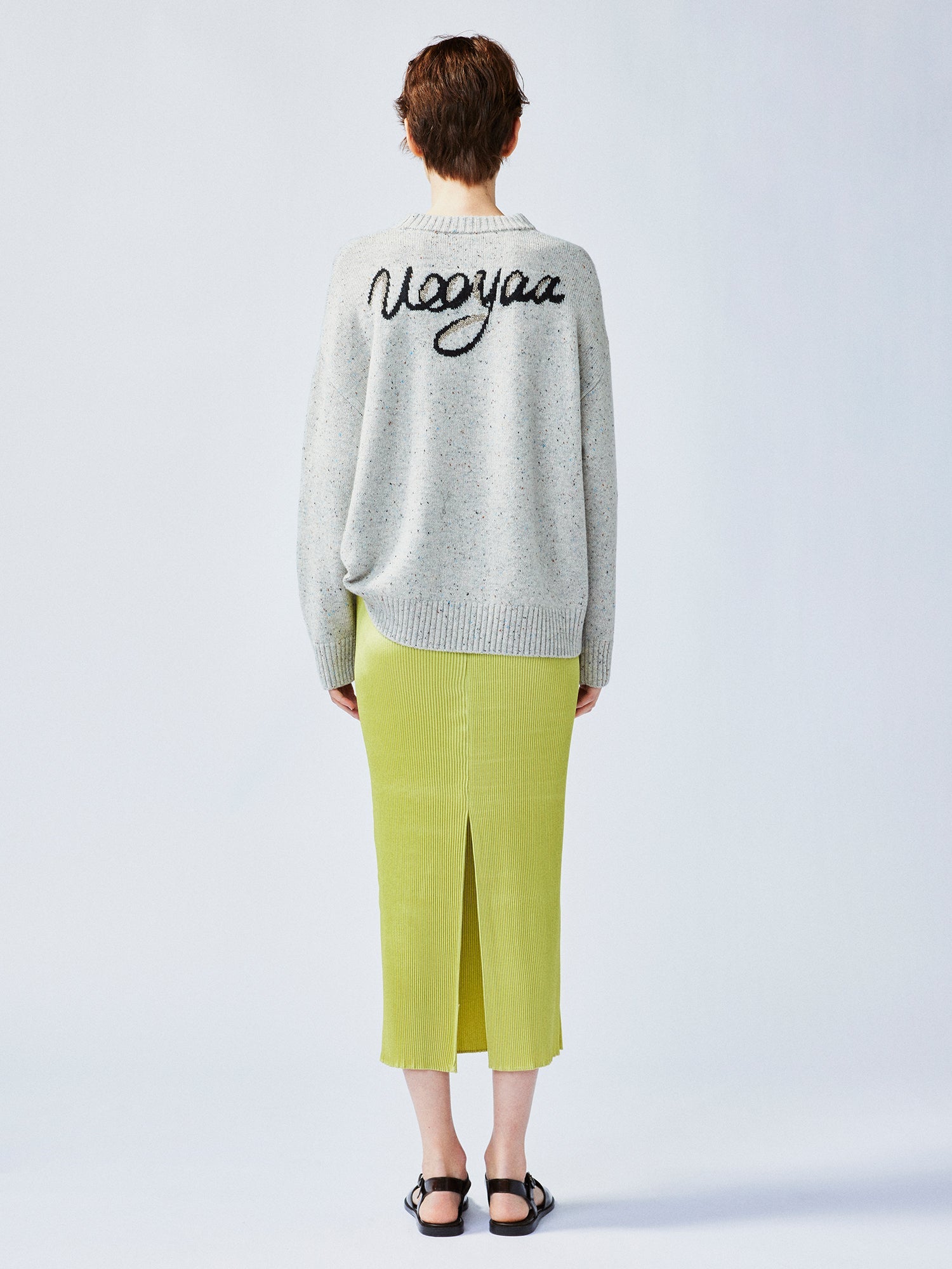 Glamorous and vibrant lime green pleated midi skirt