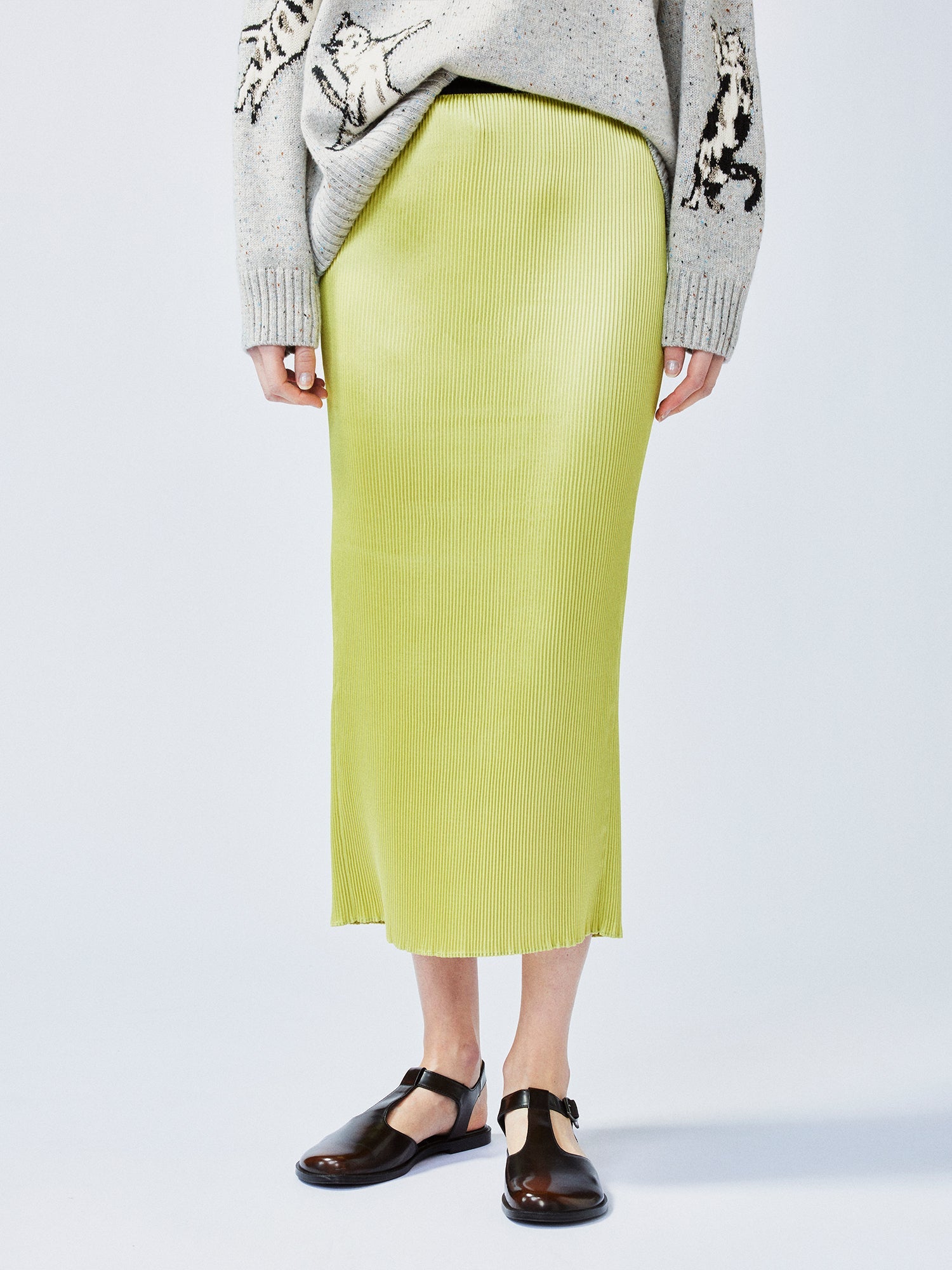 Glamorous and vibrant lime green pleated midi skirt