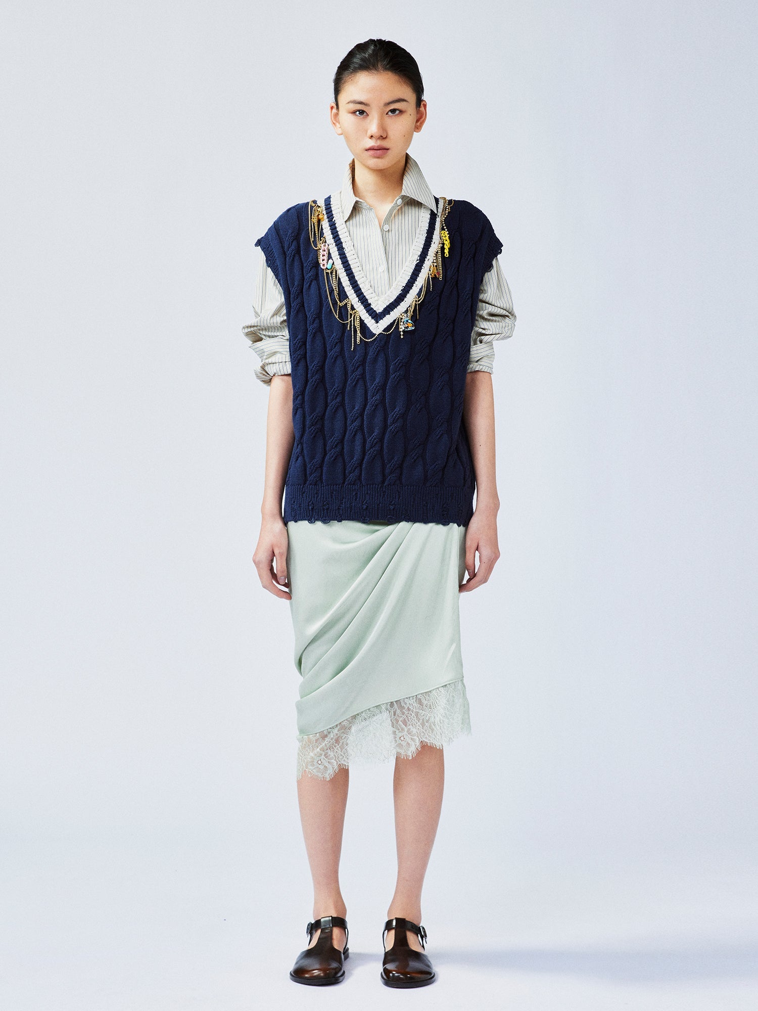 Charmingly playful diamond chain knit vest