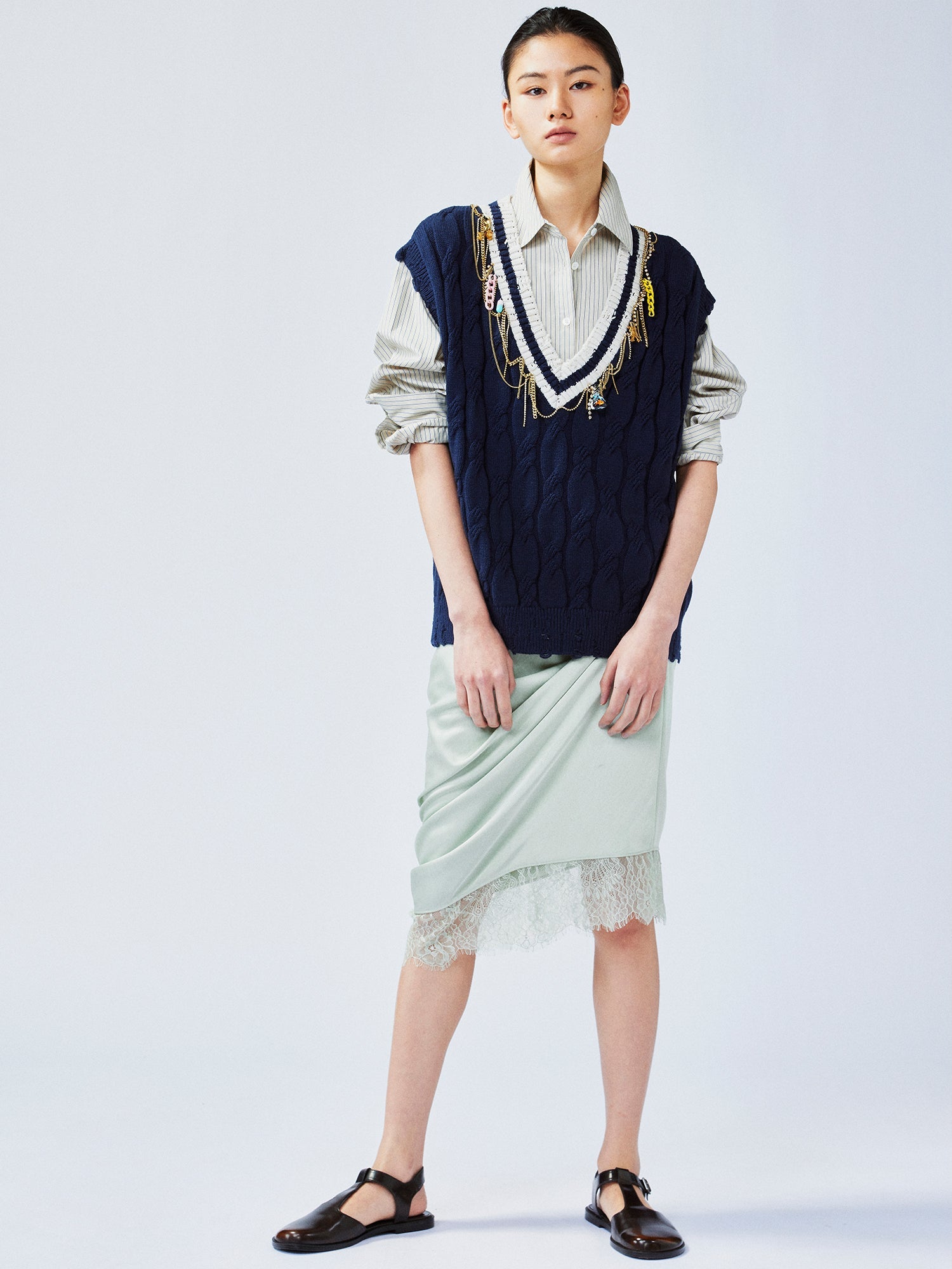 Charmingly playful diamond chain knit vest