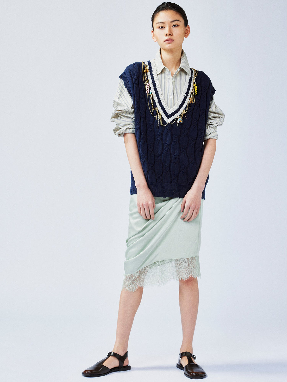 Charmingly playful diamond chain knit vest