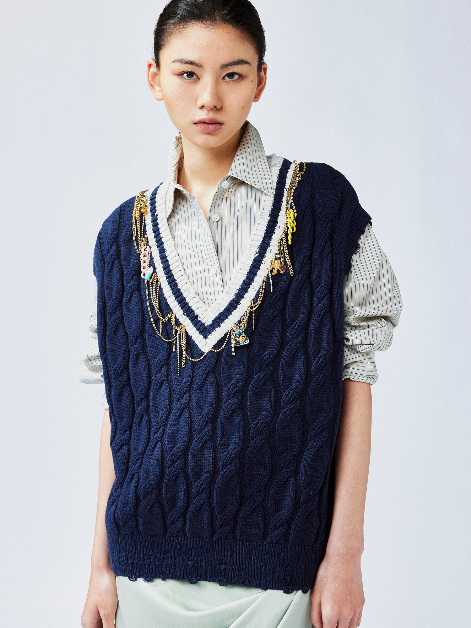 Charmingly playful diamond chain knit vest