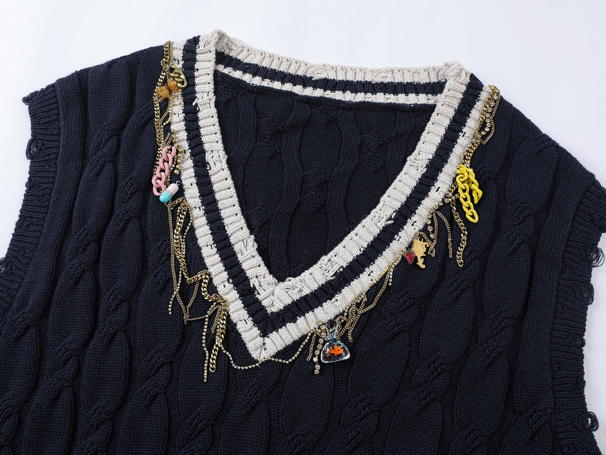 Charmingly playful diamond chain knit vest