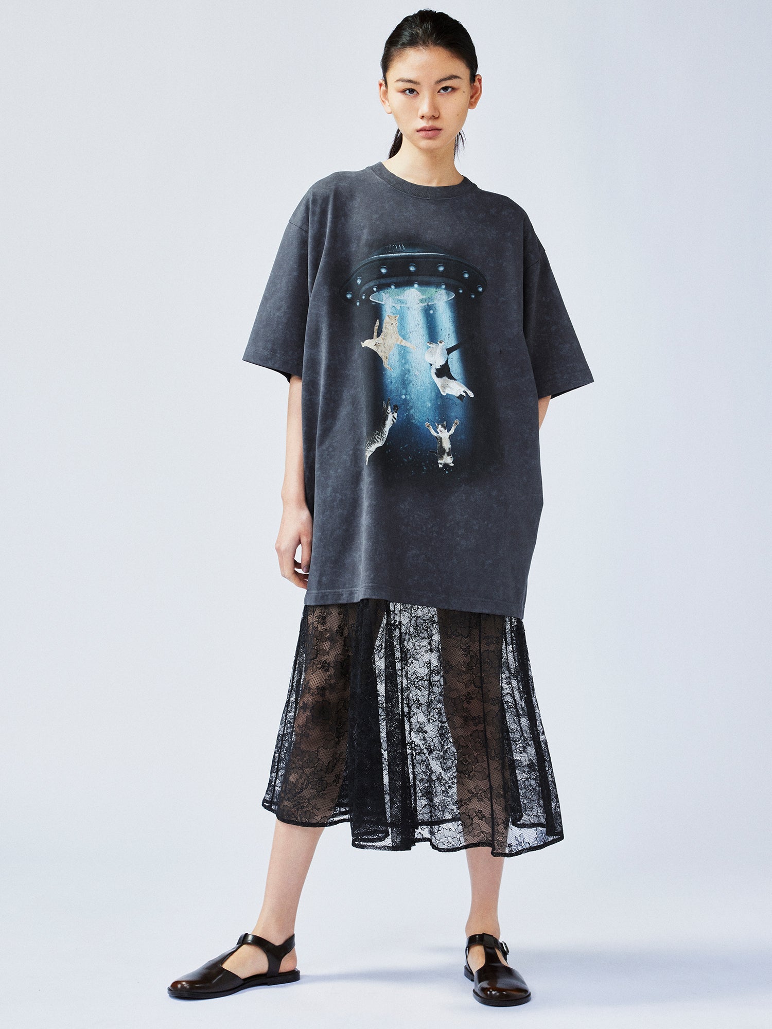 Playfully witty "UFO beaming cat" graphic T-shirt dress