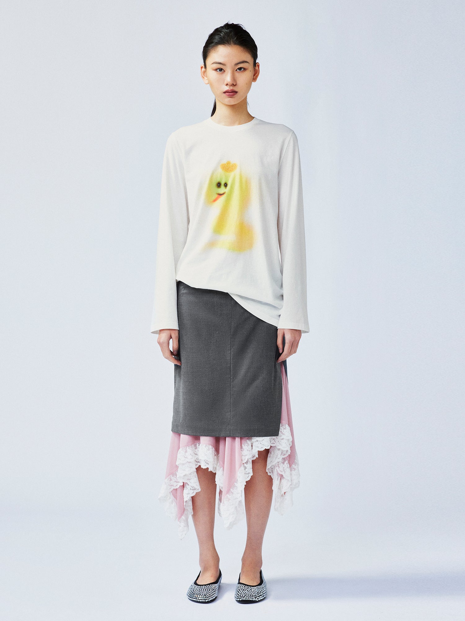 A misaligned suit layered-look skirt