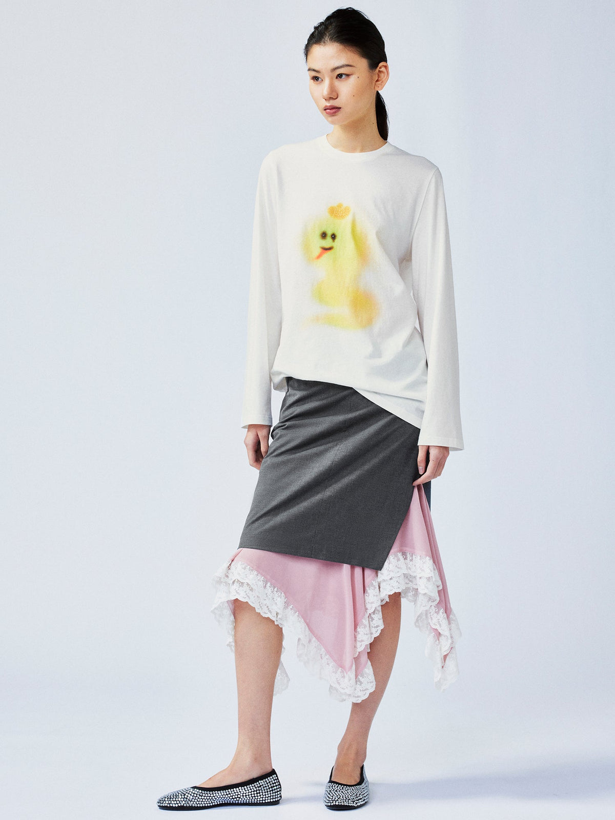 A misaligned suit layered-look skirt
