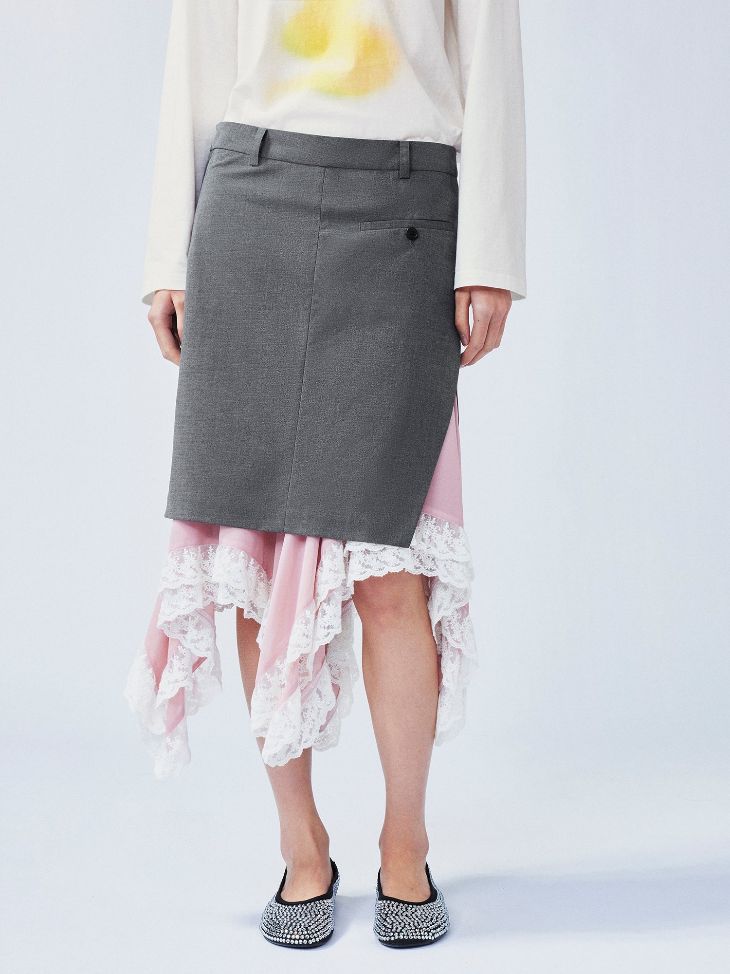A misaligned suit layered-look skirt