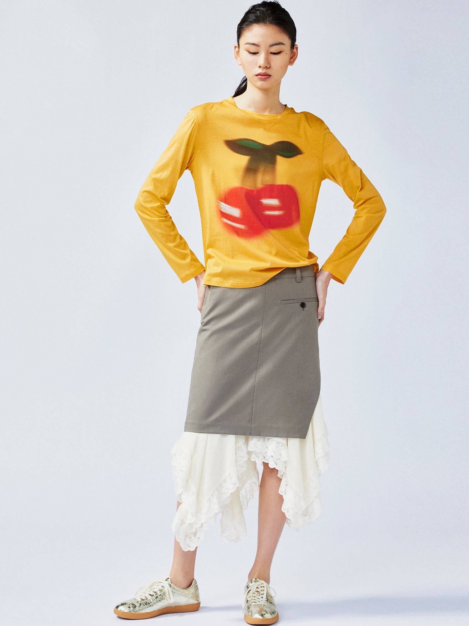 A misaligned suit layered-look skirt