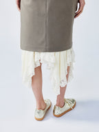 A misaligned suit layered-look skirt