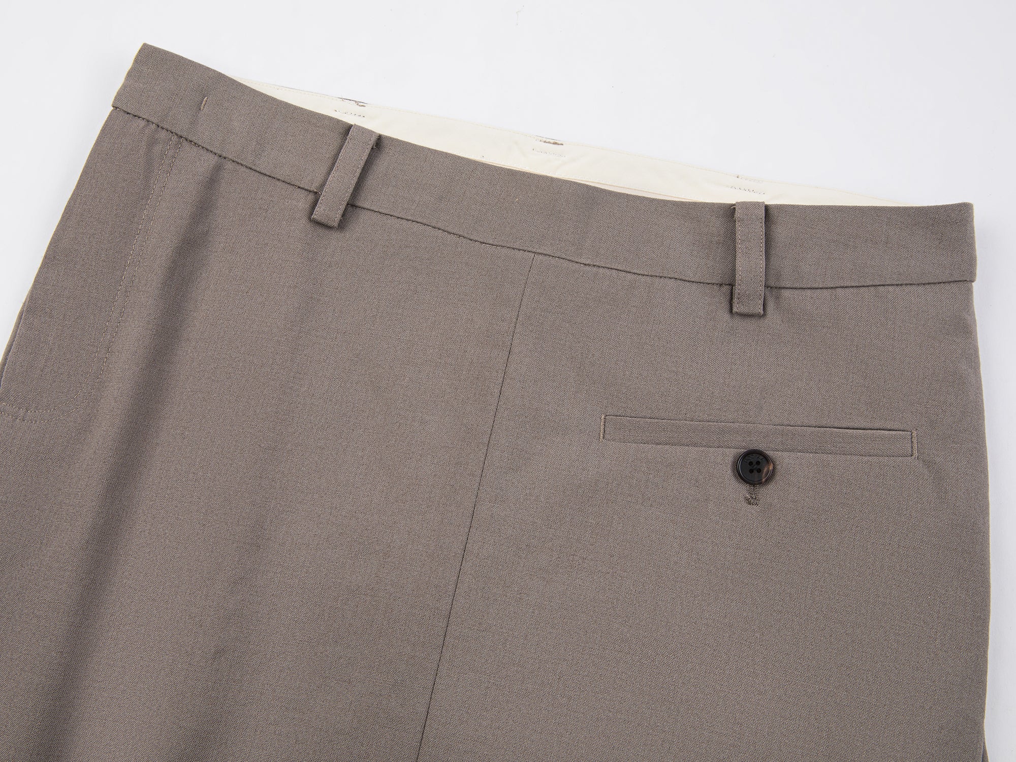 A misaligned suit layered-look skirt