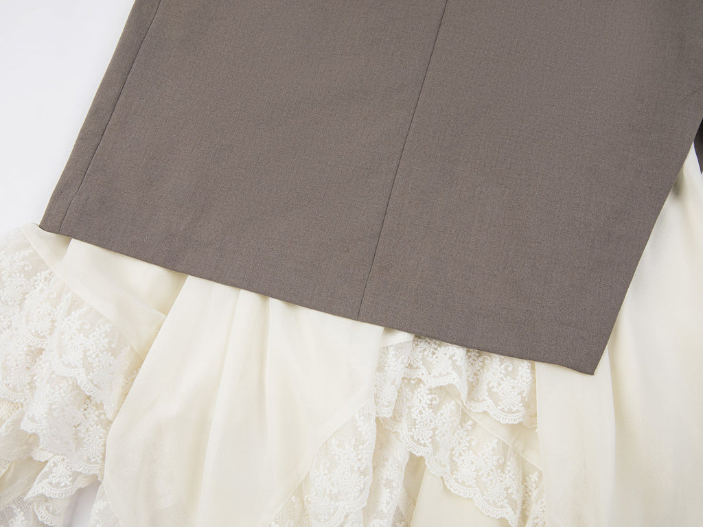 A misaligned suit layered-look skirt