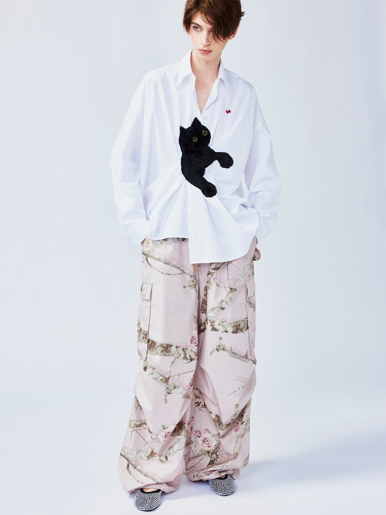 Playful cat chasing butterfly shirt