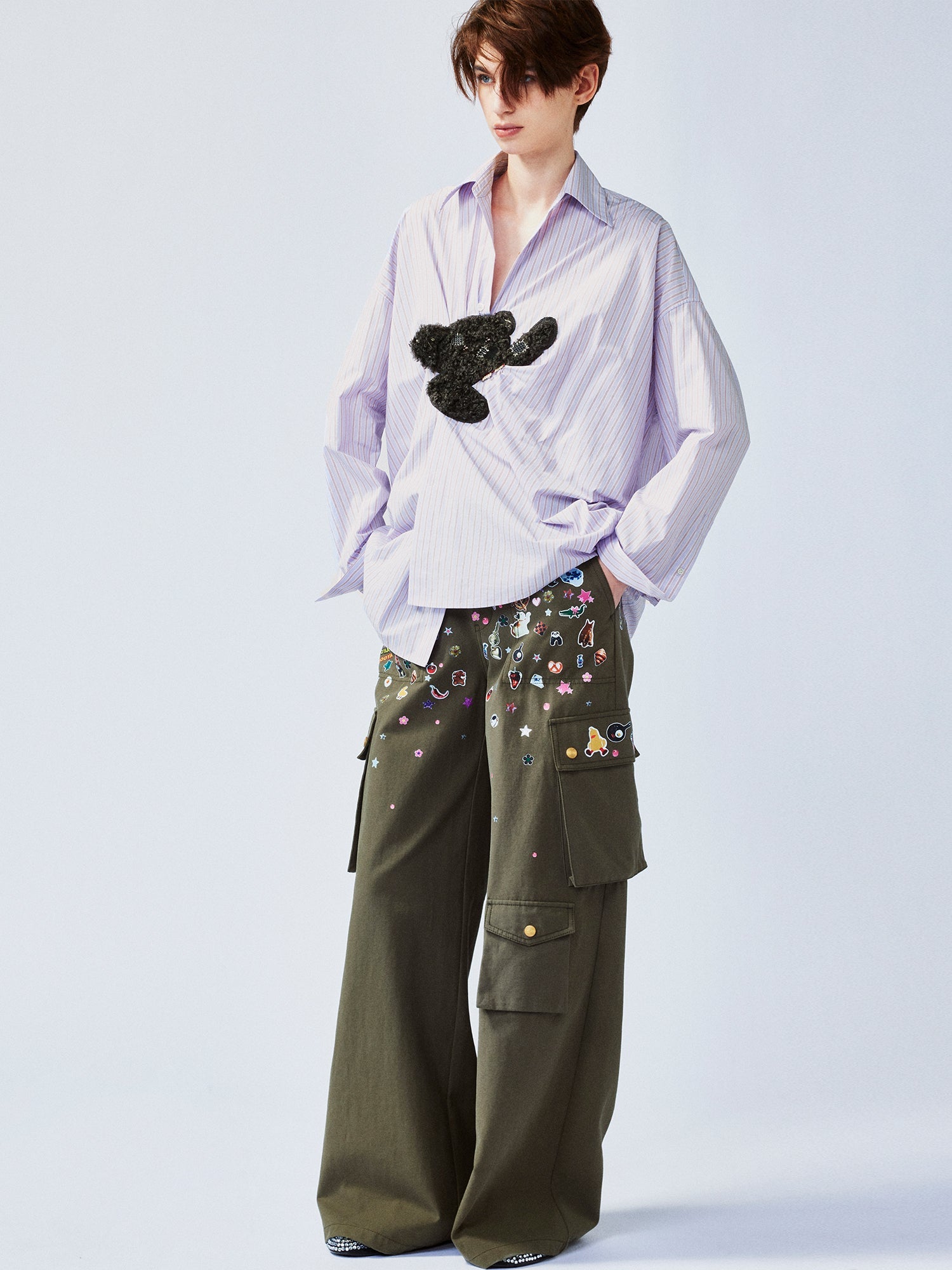 Playful puppy biting shirt