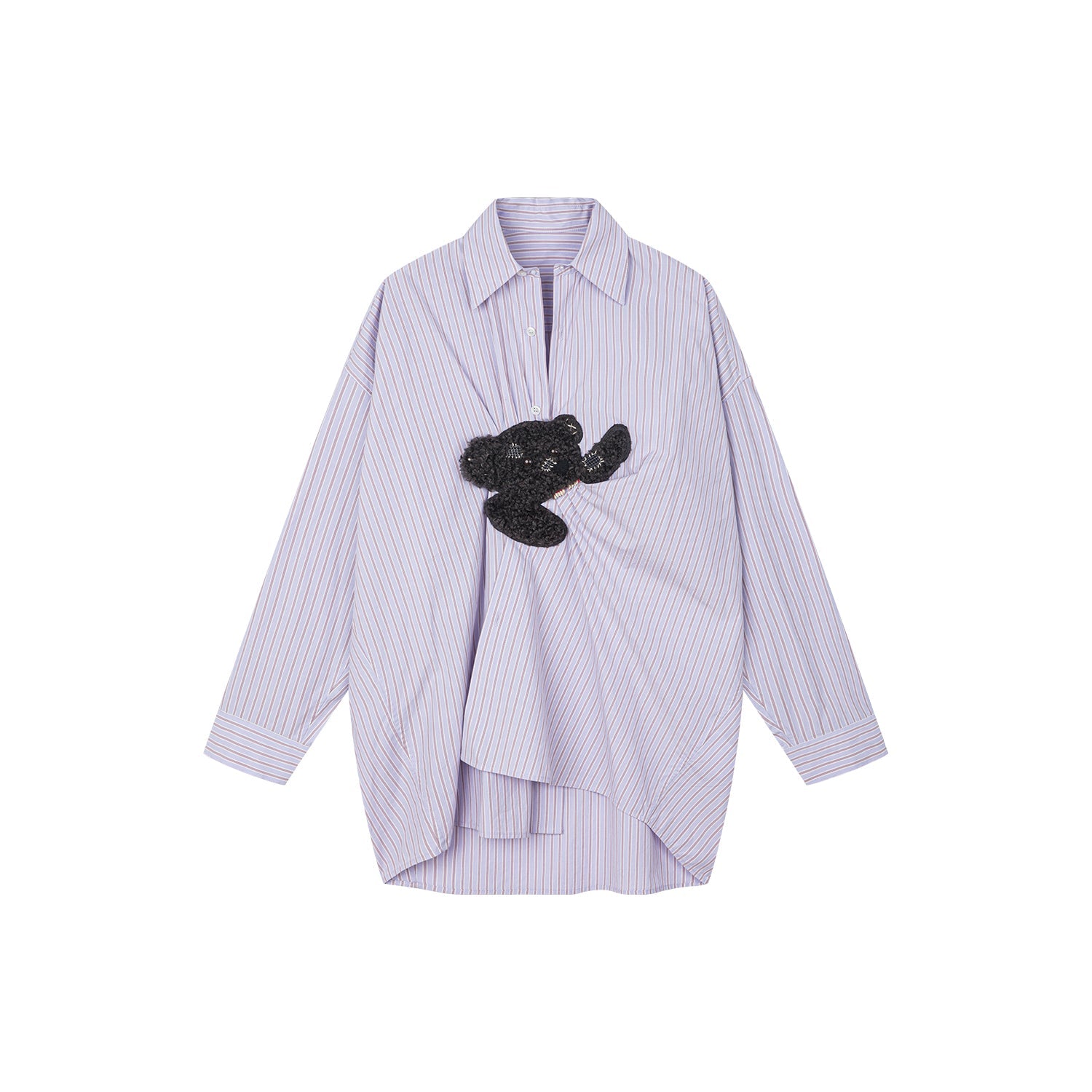 Playful puppy biting shirt