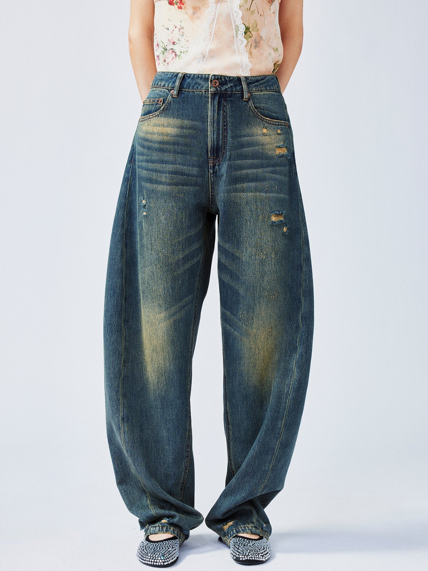 Wardrobe essential distressed wash scythe-cut jeans