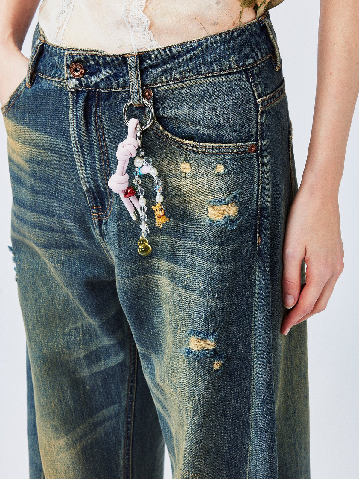 Wardrobe essential distressed wash scythe-cut jeans