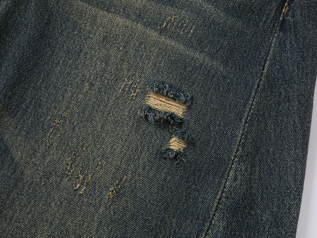 Wardrobe essential distressed wash scythe-cut jeans