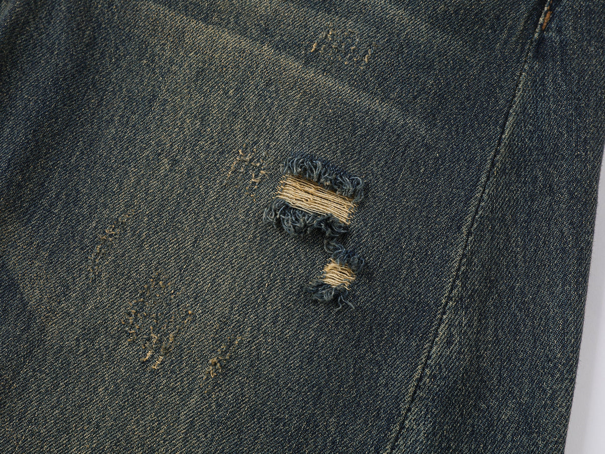 Wardrobe essential distressed wash scythe-cut jeans