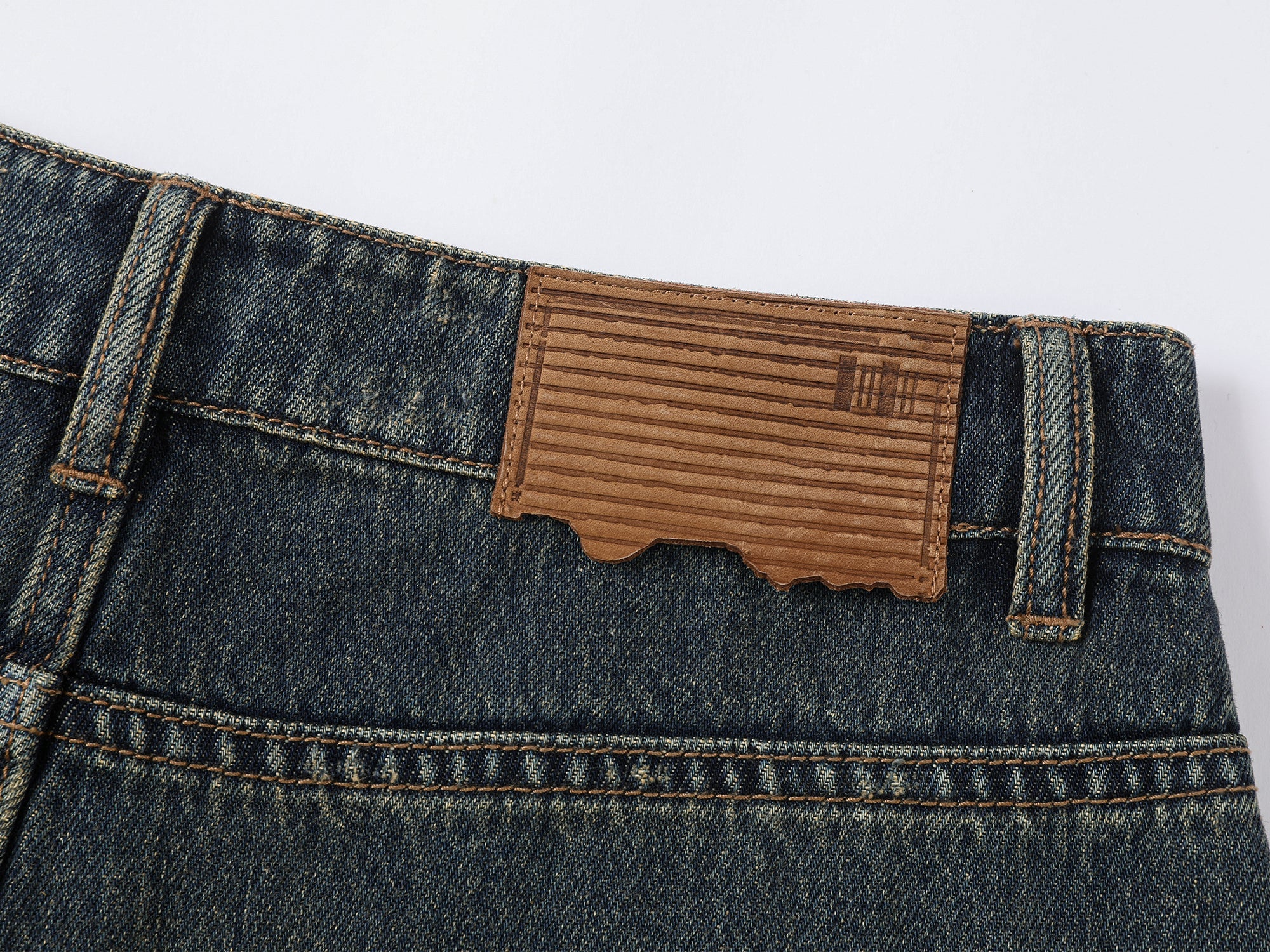 Wardrobe essential distressed wash scythe-cut jeans