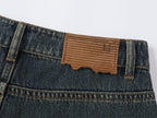 Wardrobe essential distressed wash scythe-cut jeans