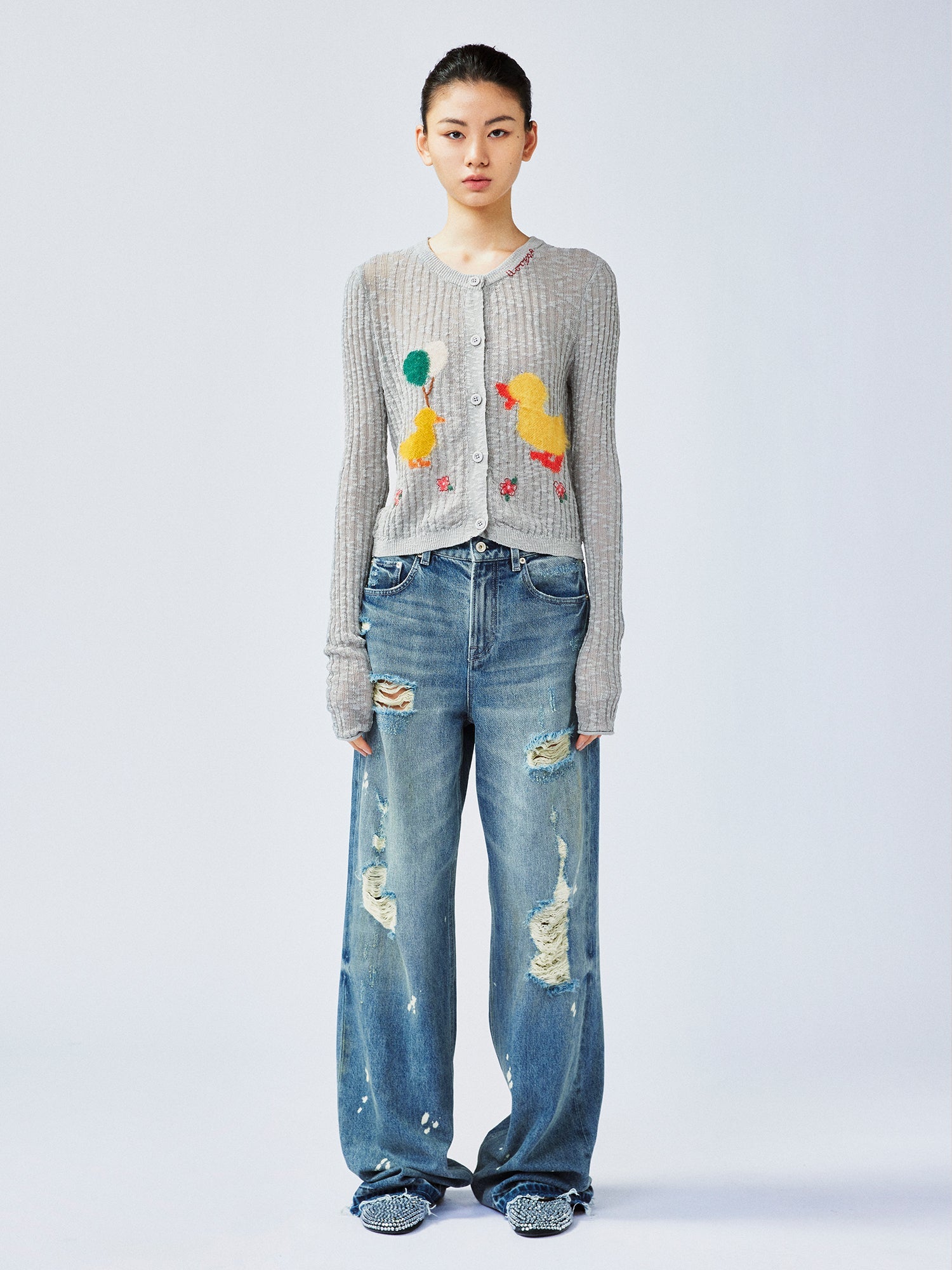 "Playful duck" wool cardigan