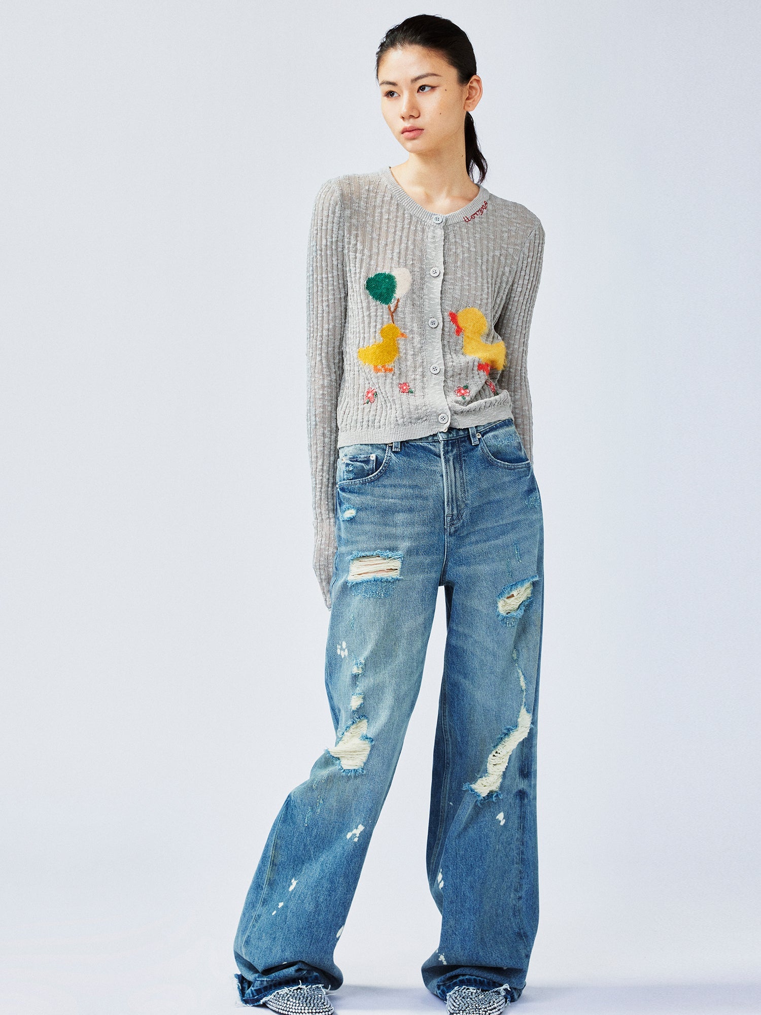 "Playful duck" wool cardigan