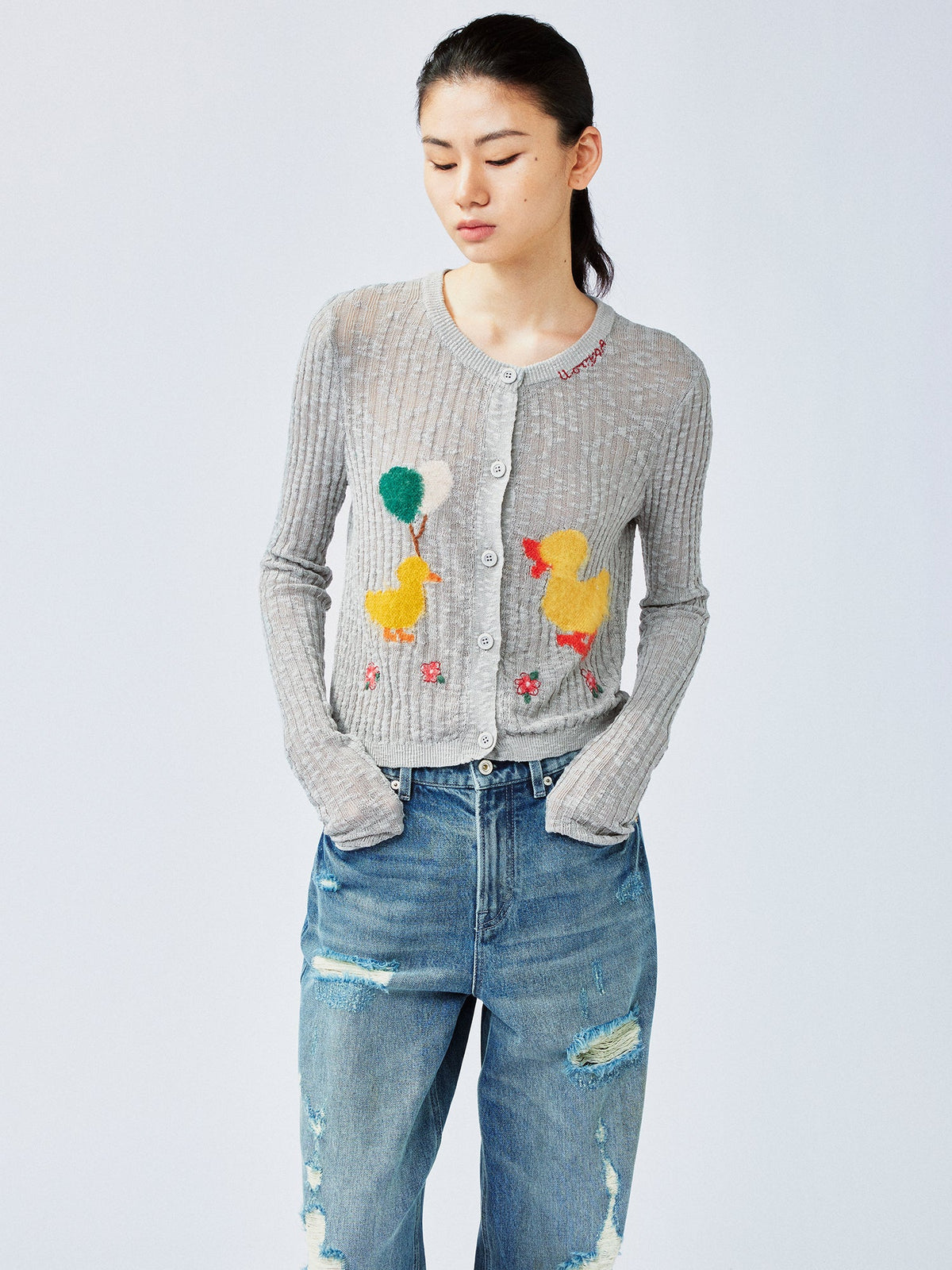 "Playful duck" wool cardigan