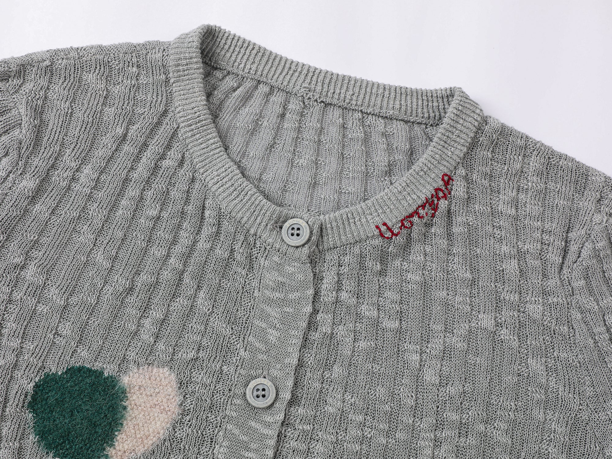 "Playful duck" wool cardigan