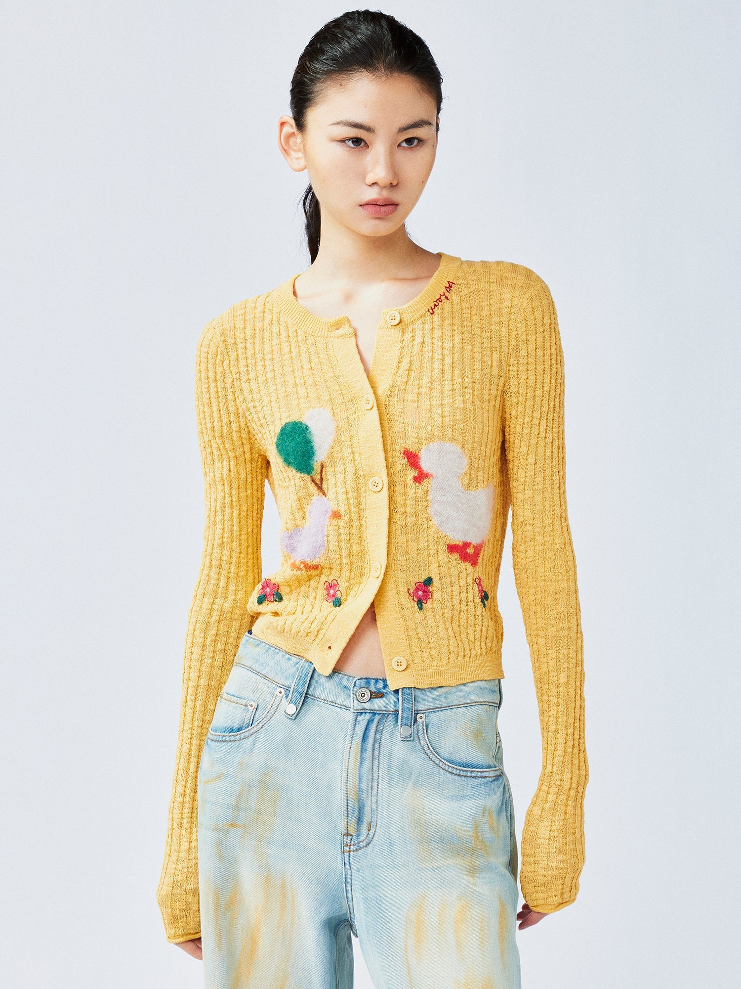 "Playful duck" wool cardigan