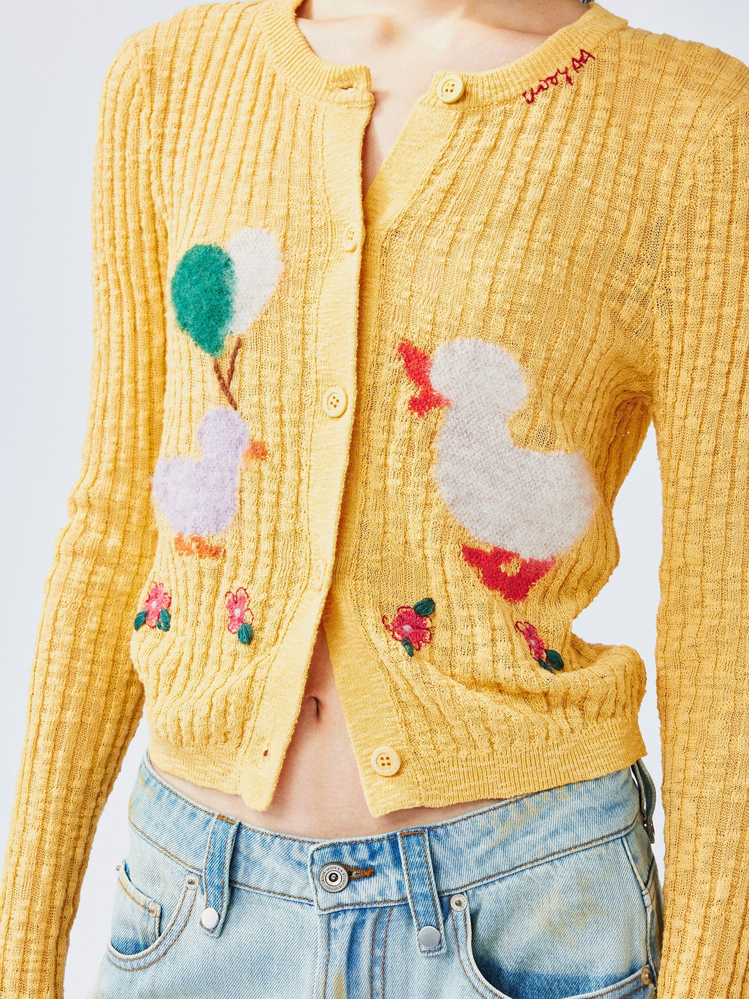 "Playful duck" wool cardigan