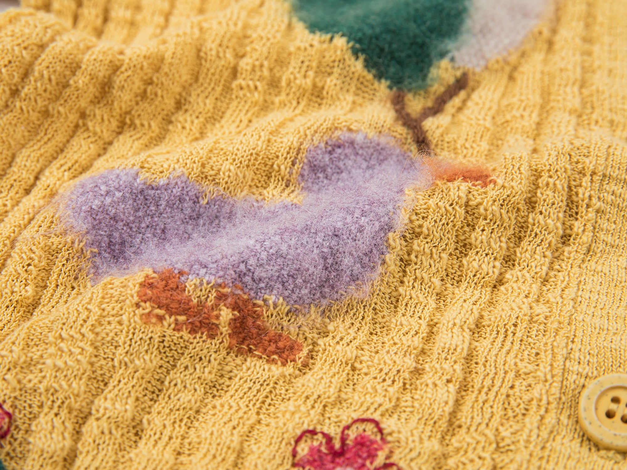 "Playful duck" wool cardigan