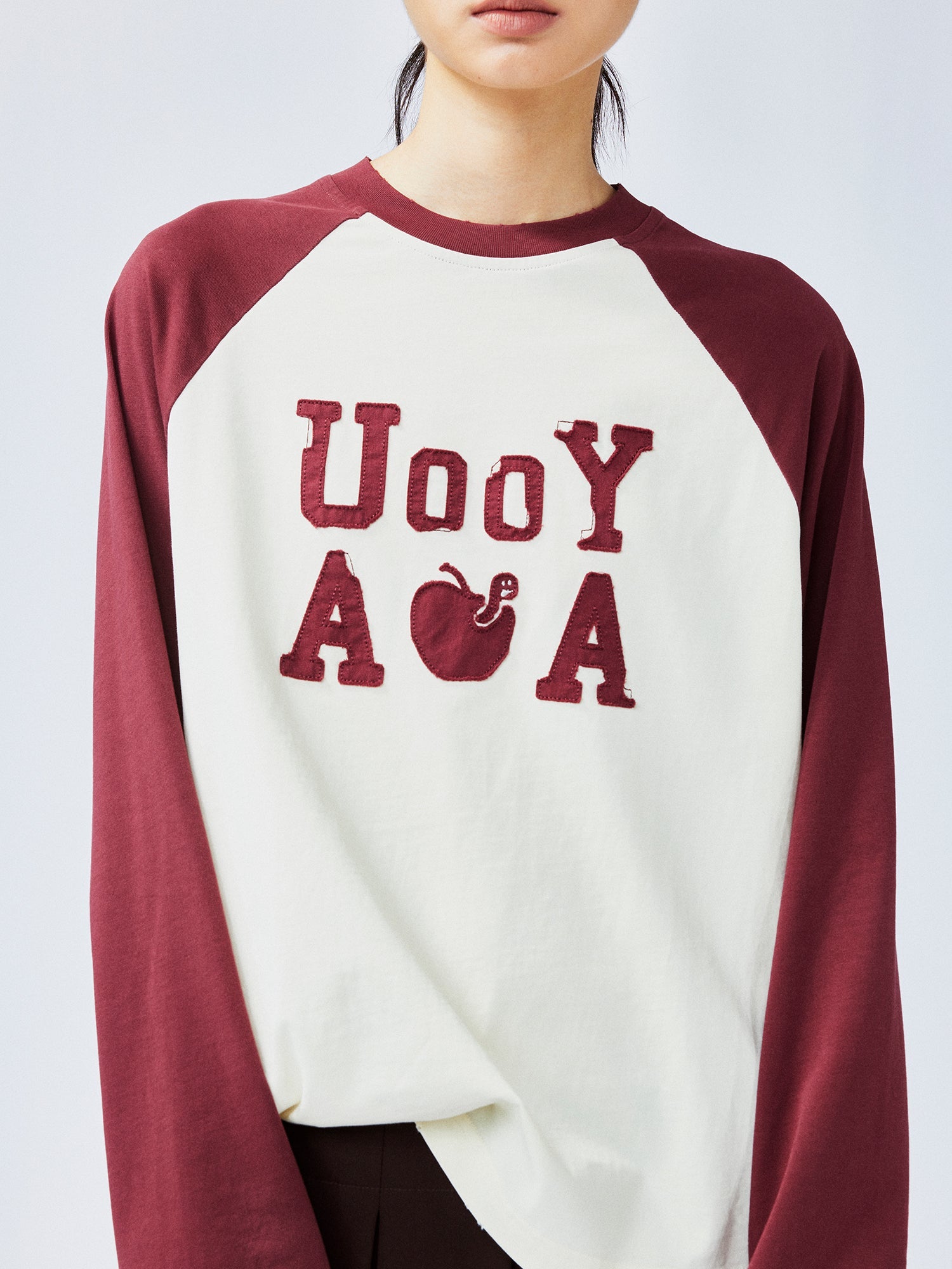 Playful apple worm raglan sleeve T-shirt