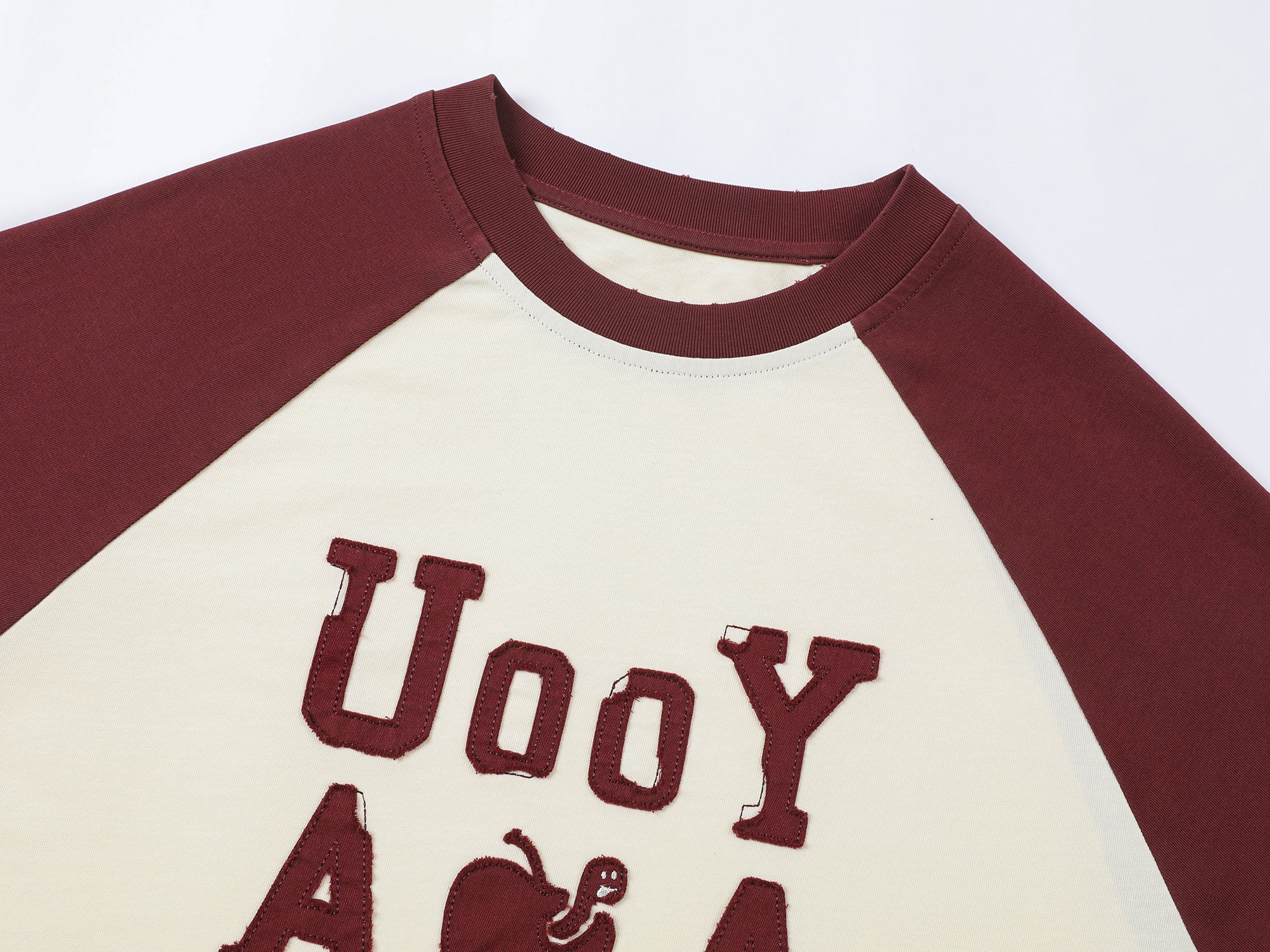Playful apple worm raglan sleeve T-shirt