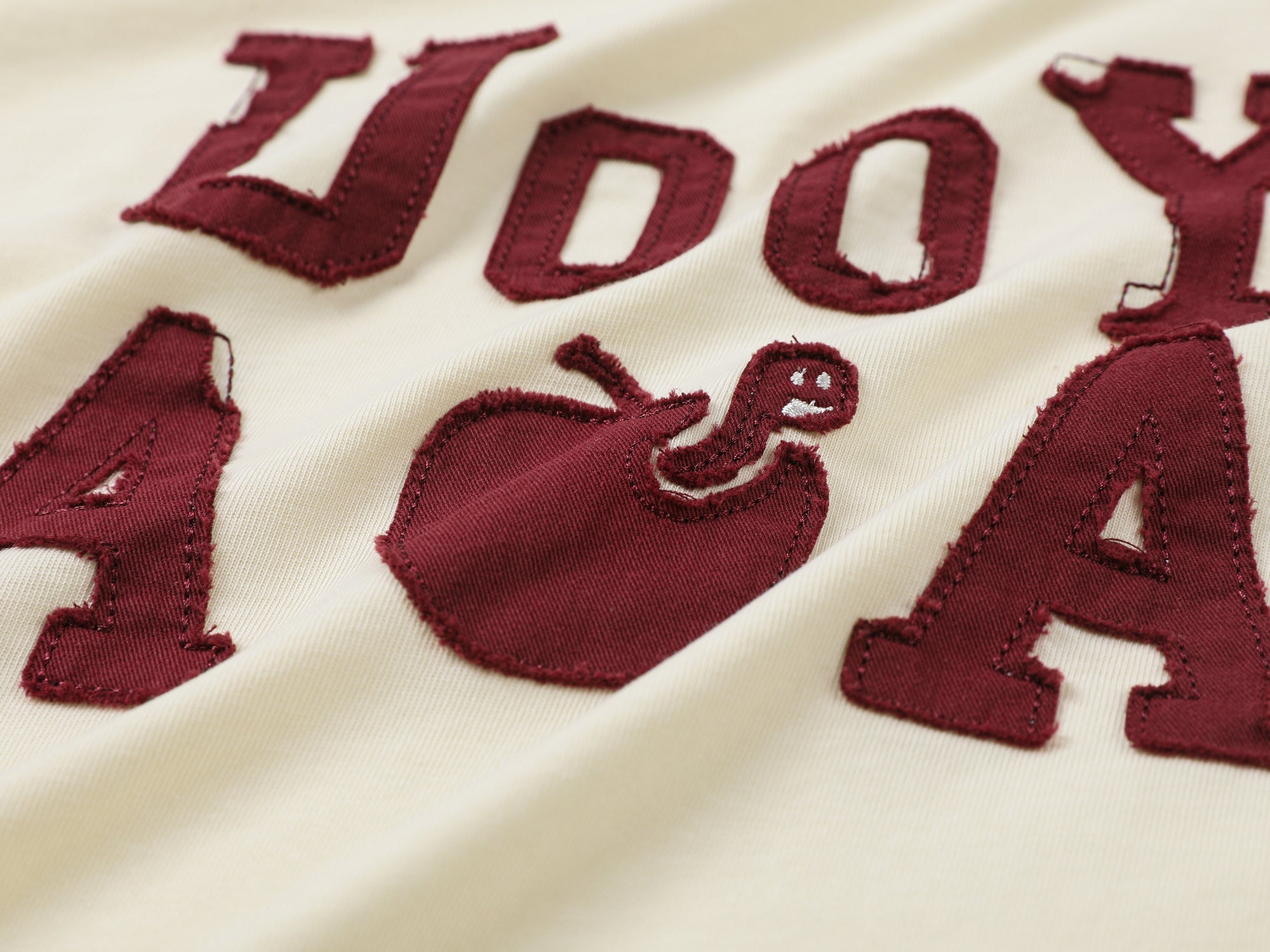 Playful apple worm raglan sleeve T-shirt