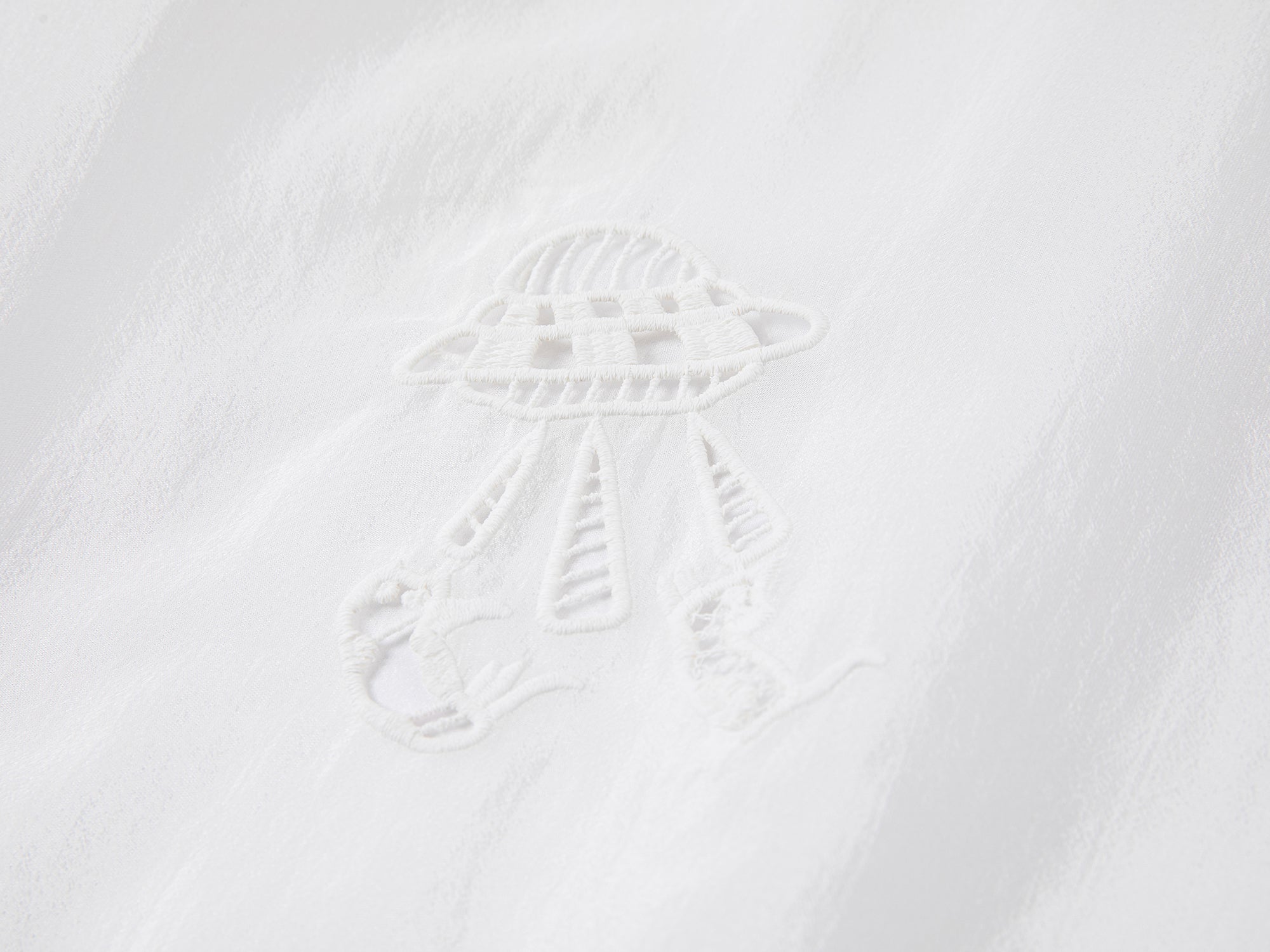 Embroidered cutout hooded shirt