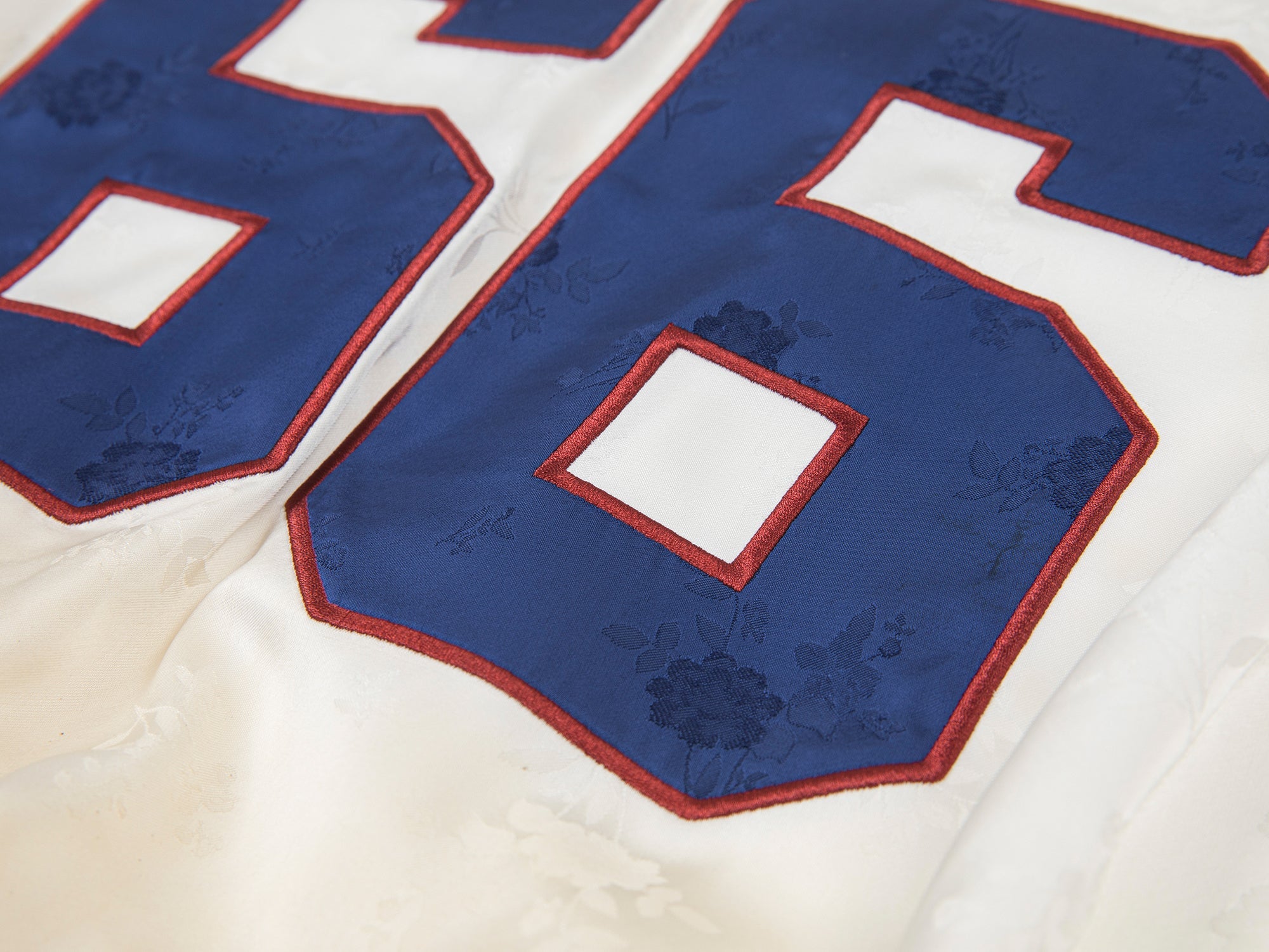 Distressed satin tulip jersey