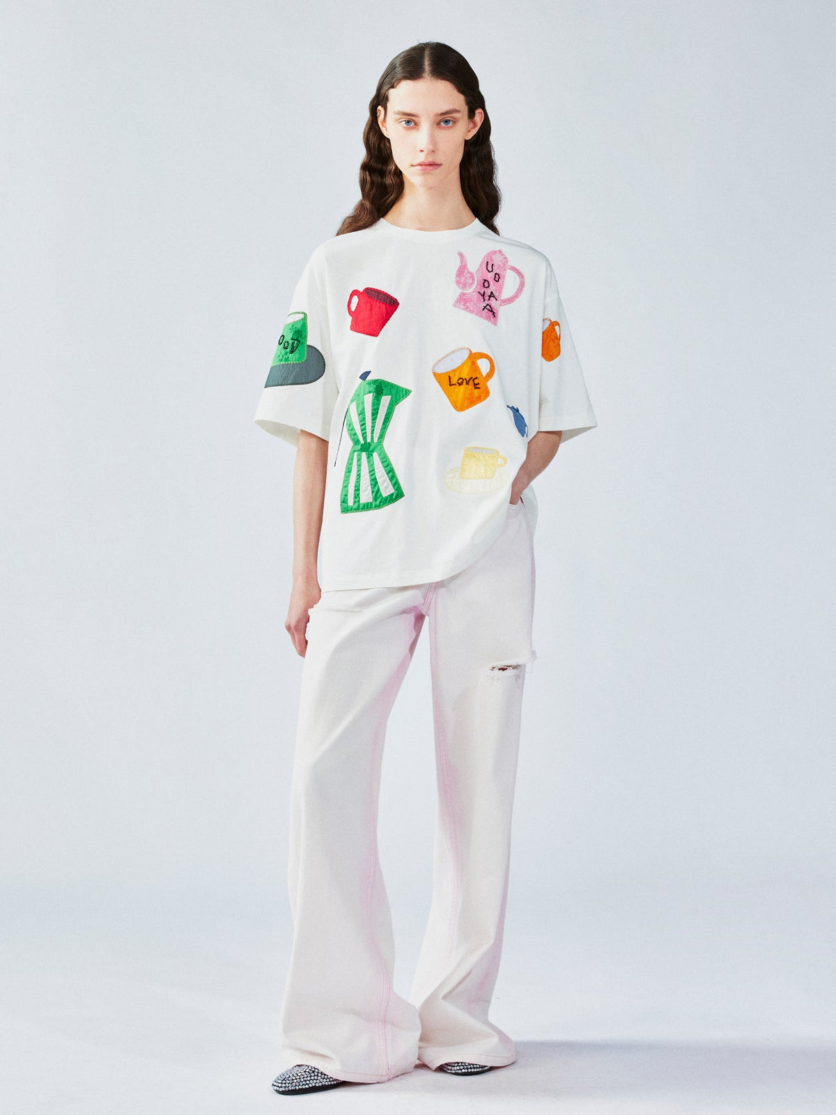 家庭用品のシルエットアップリケTシャツ